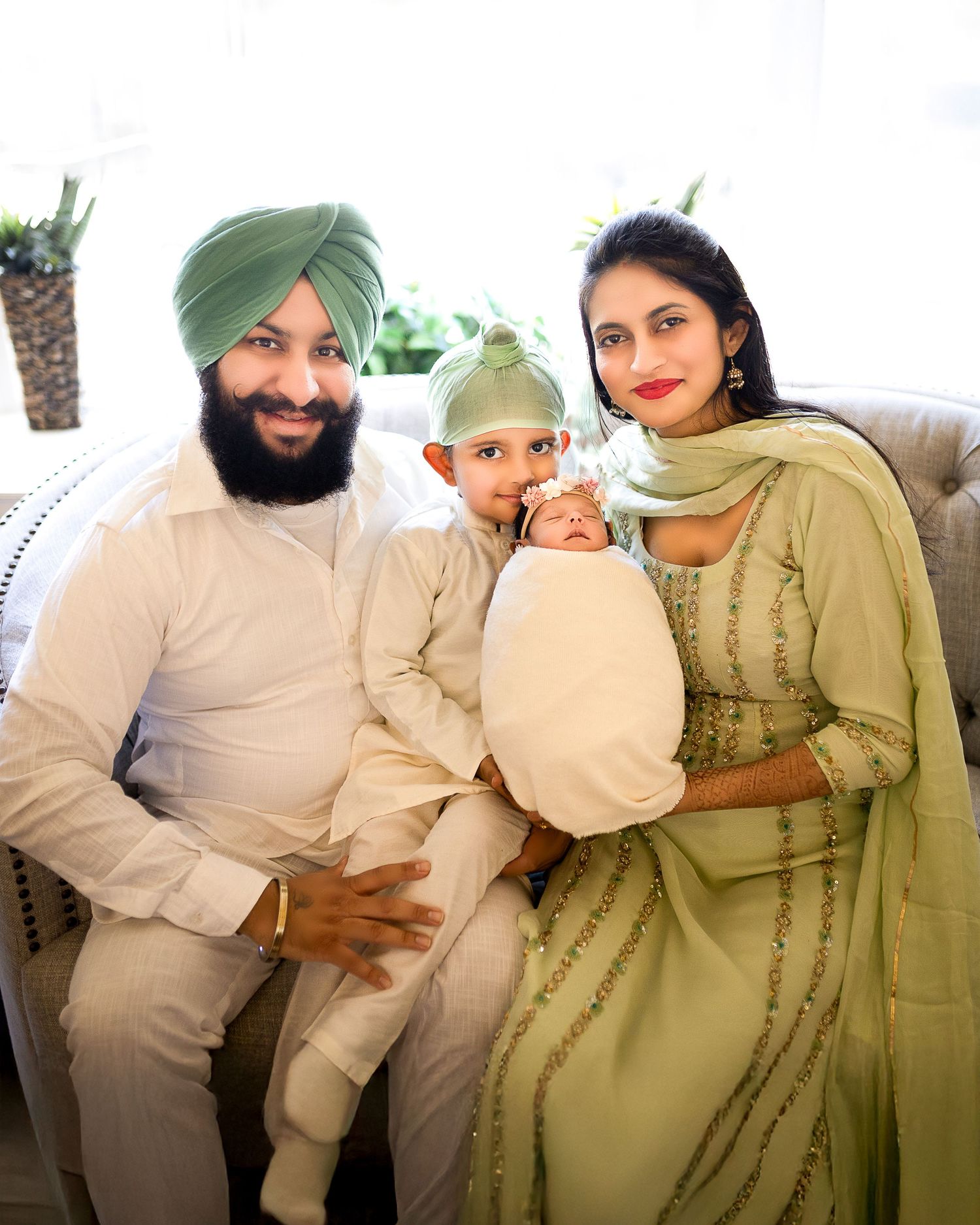 Four candid photos show people in traditional Punjabi attire sharing joyful moments at a cultural celebration.