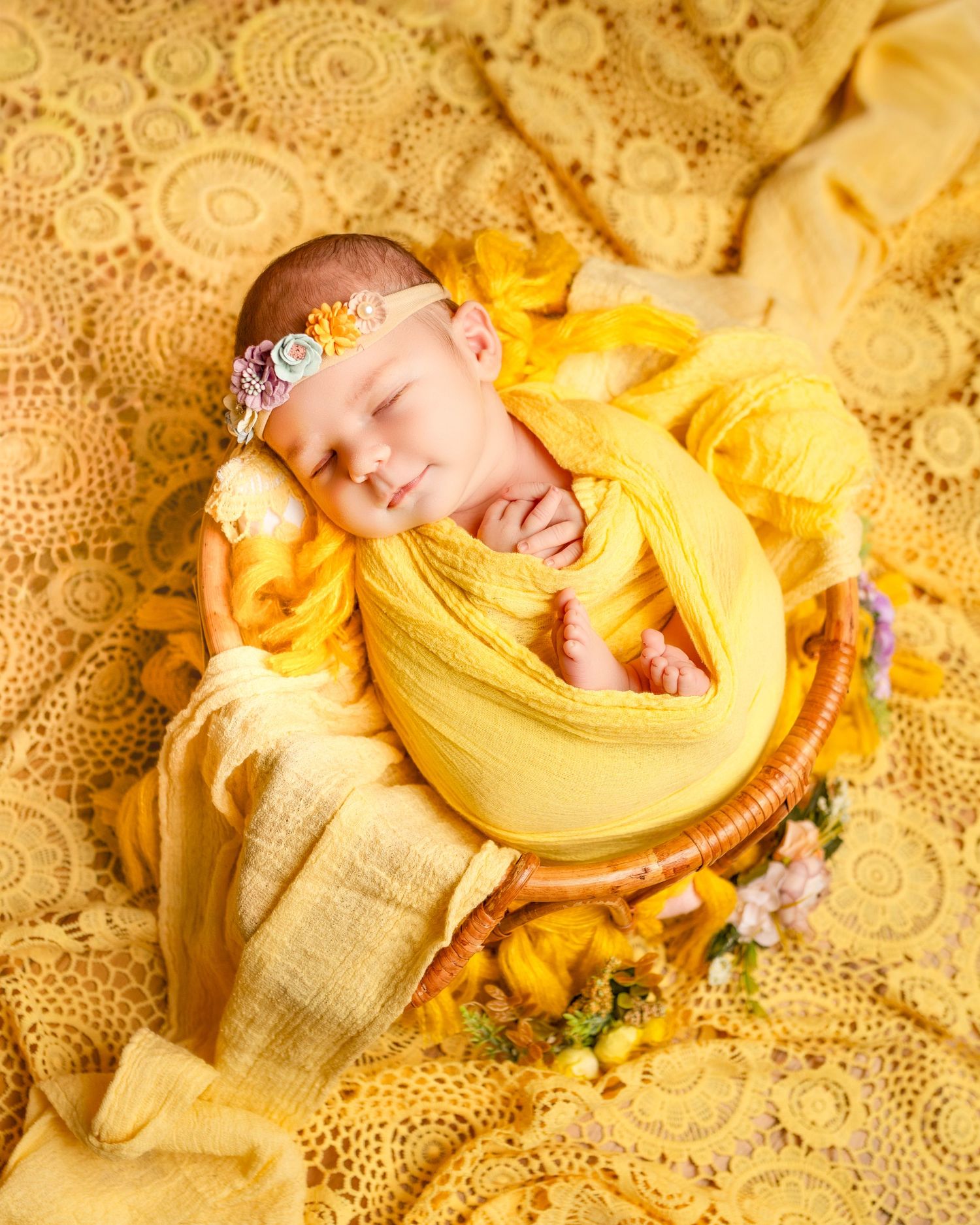 Soft yellow textiles and lace create a warm, cozy setting with delicate patterns and textures.