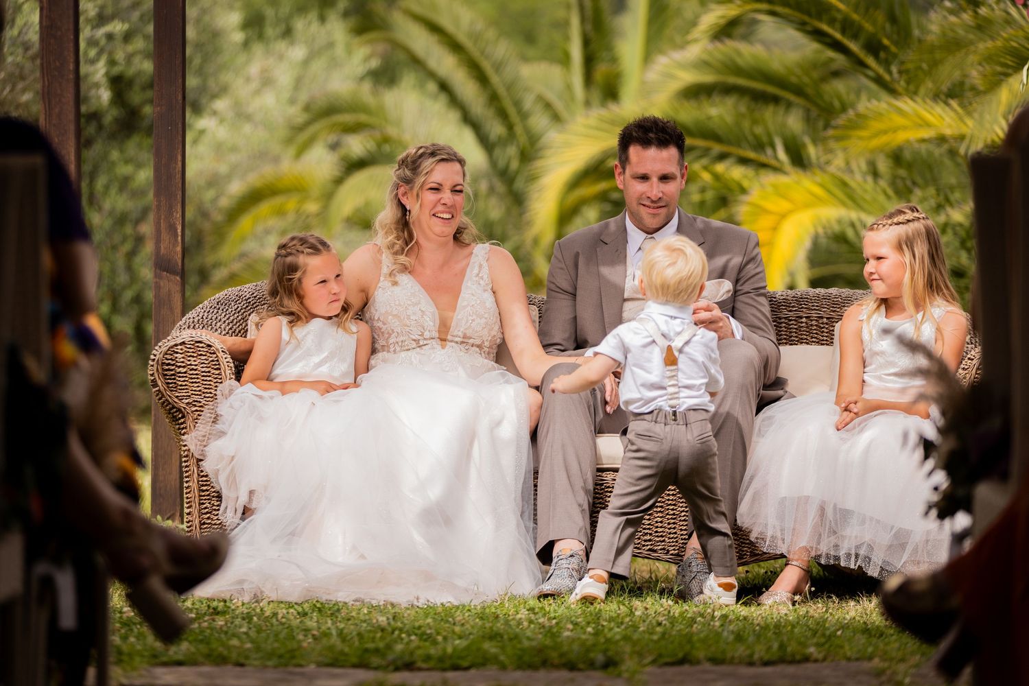 A series of romantic wedding portraits show tender moments between couples in a garden setting with soft natural lighting.