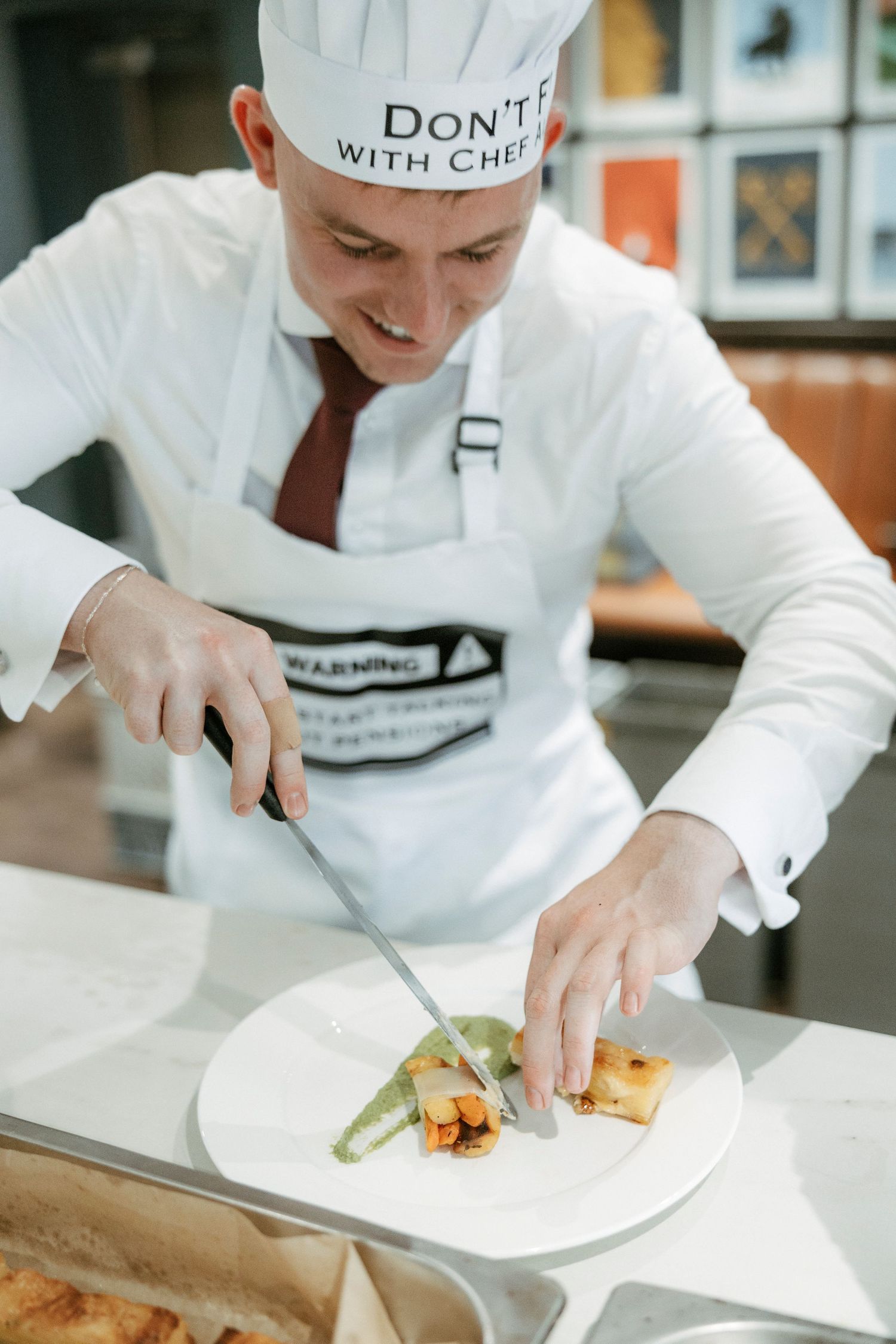 Chef in white uniform with 