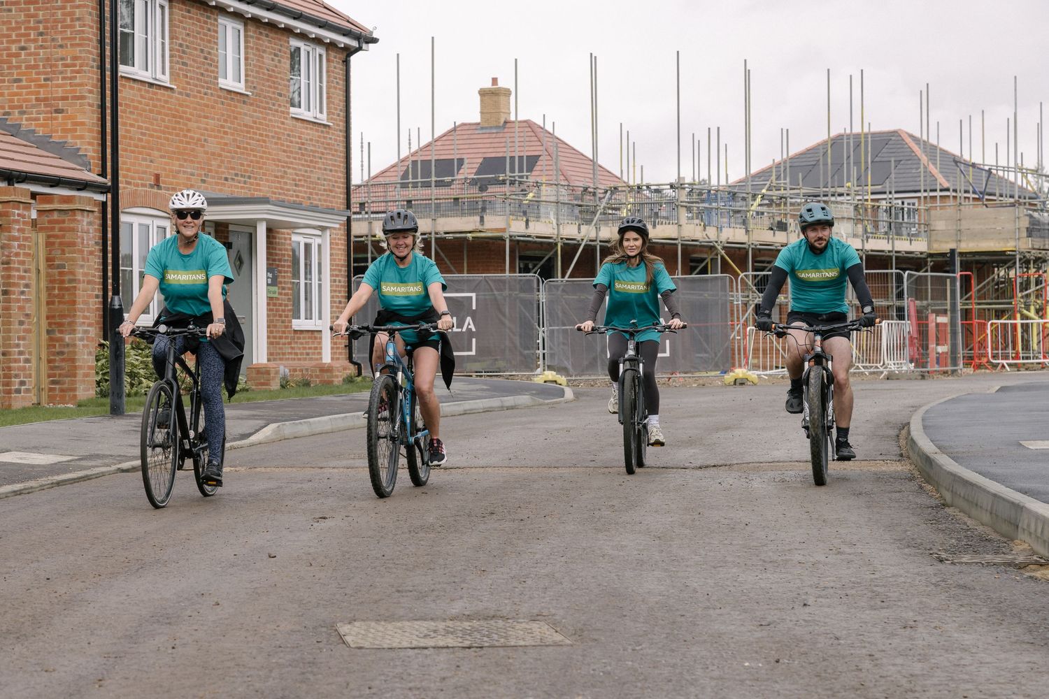 Volunteers taking part in a charity bike ride.