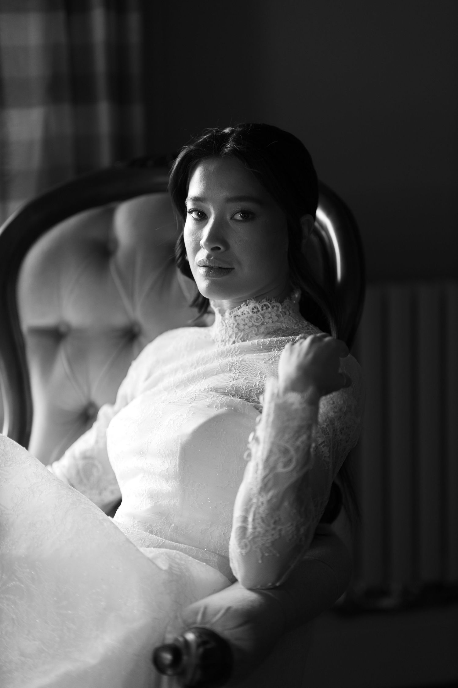 Black and white bridal portrait series showing lace details in dramatic lighting.