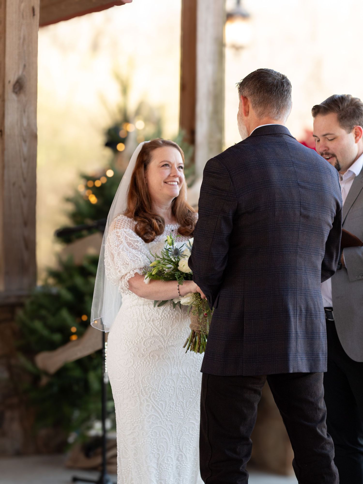 Bride smiles towards her love.