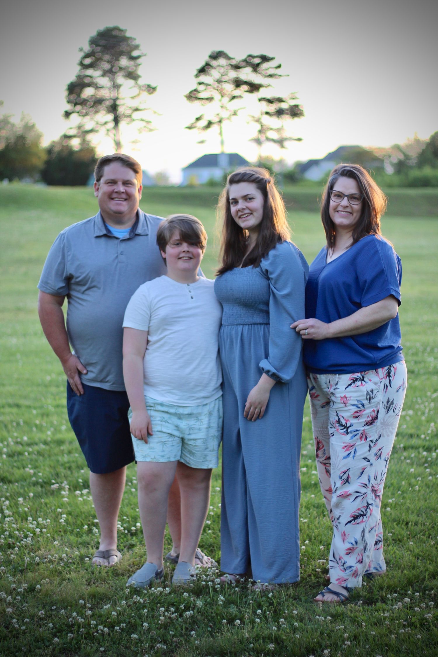 Family photos in blue with a green background.