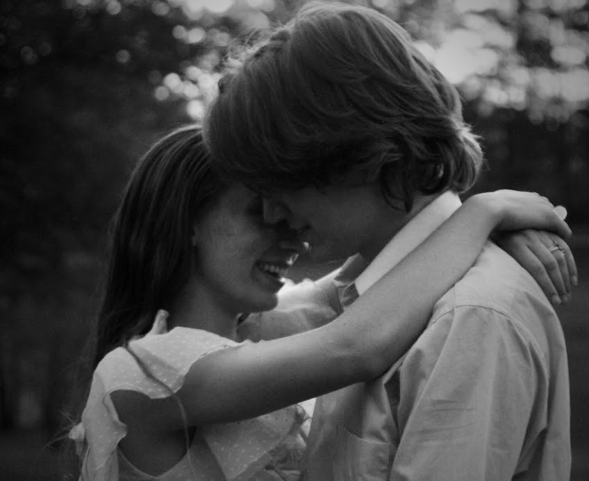 A black and white shot of a beautiful couple.