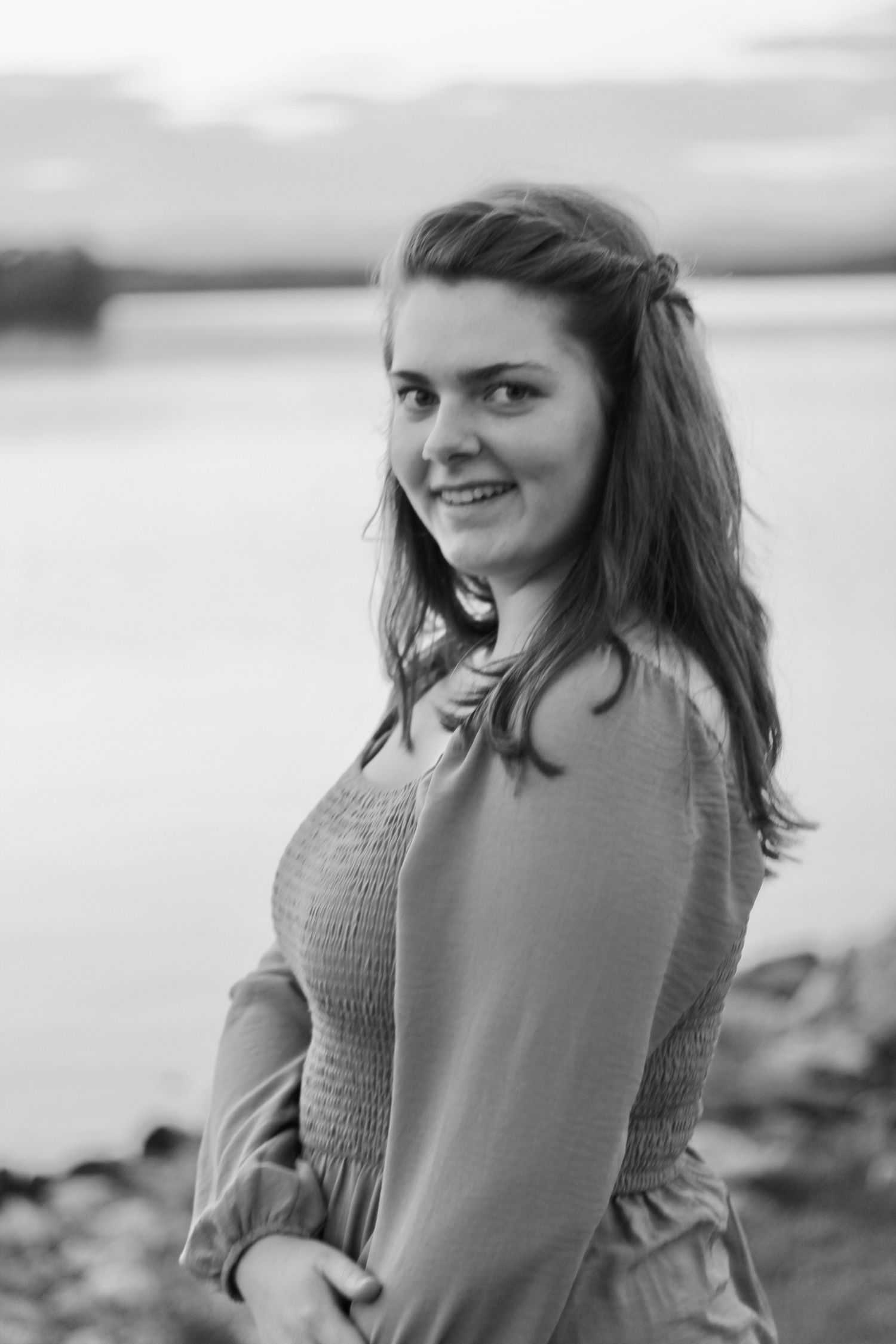 This young lady poses for the camera in front of Lake Robinson.