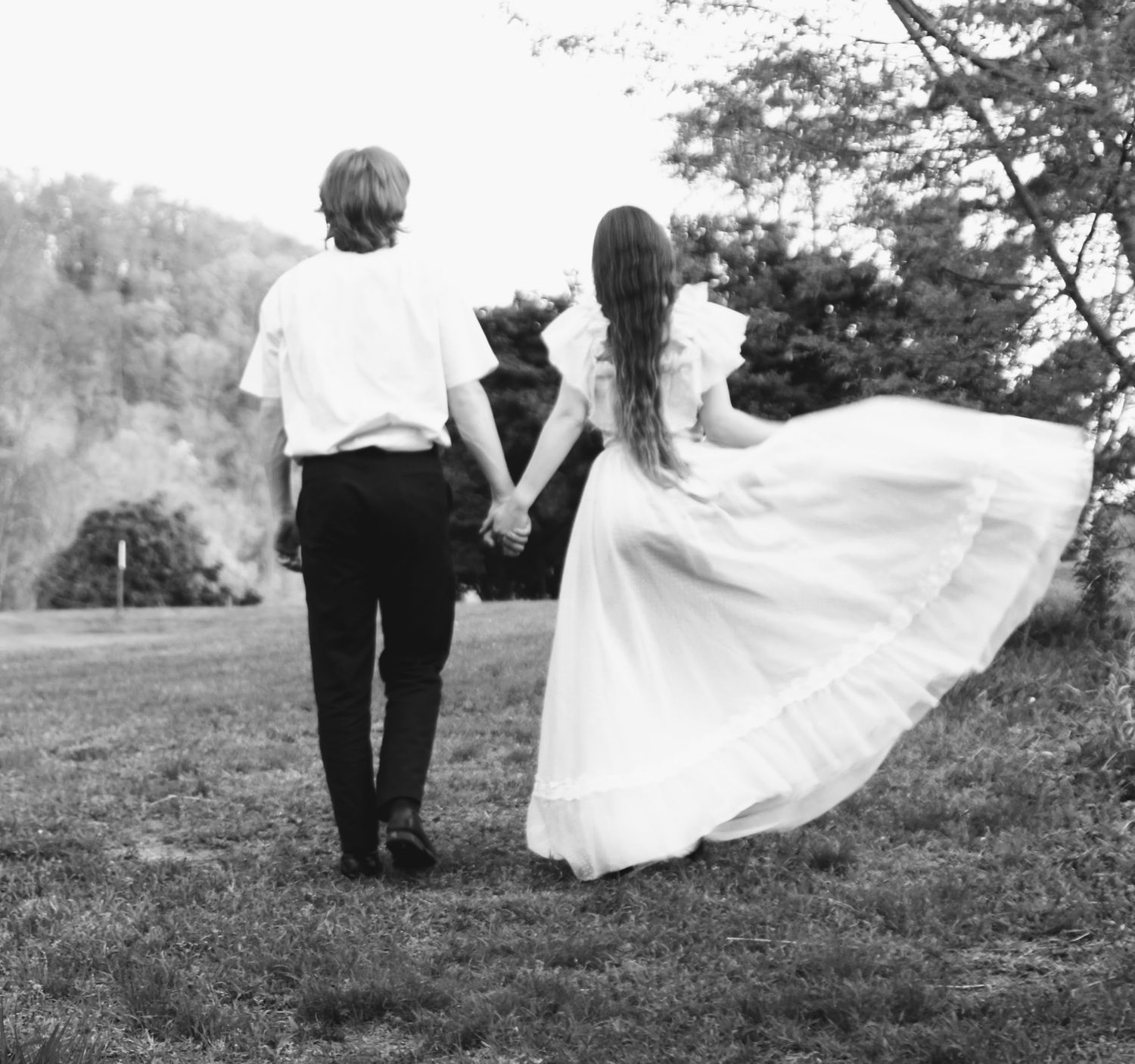 Walking together into the future, this couple is gorgeous in black and white.