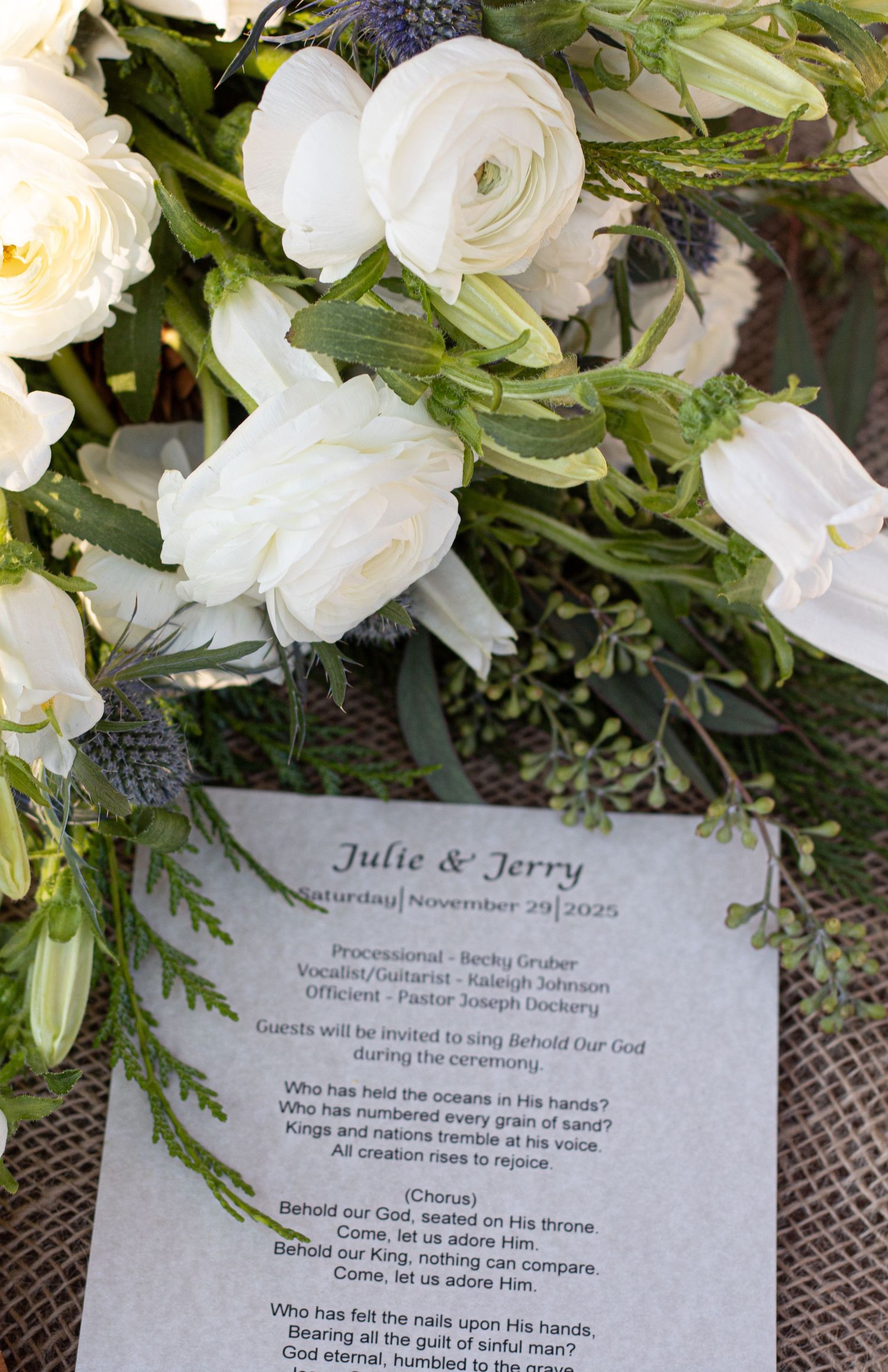 The beautiful details of the bride and groom's bouquet and program.