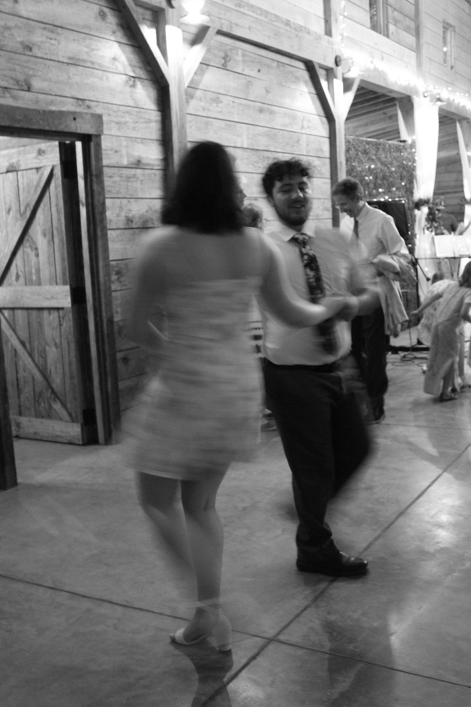 A couple twirls through the dance.
