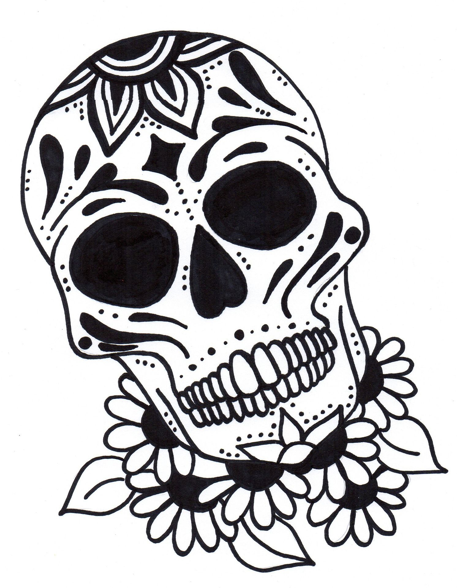 Black and white illustration of decorative sugar skulls with floral designs in Day of the Dead style.