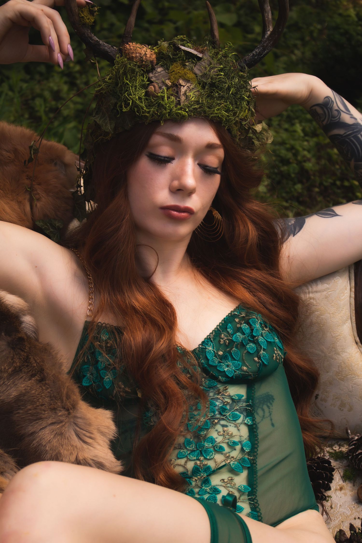 Romantic forest photoshoot featuring teal lace lingerie and natural lighting.