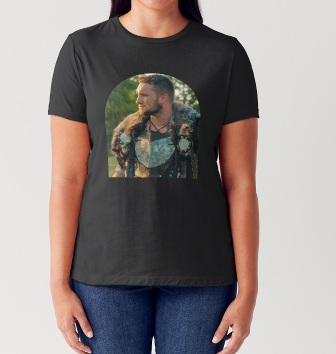 Black t-shirt mockup displayed on torso with artistic photo print design across chest area.