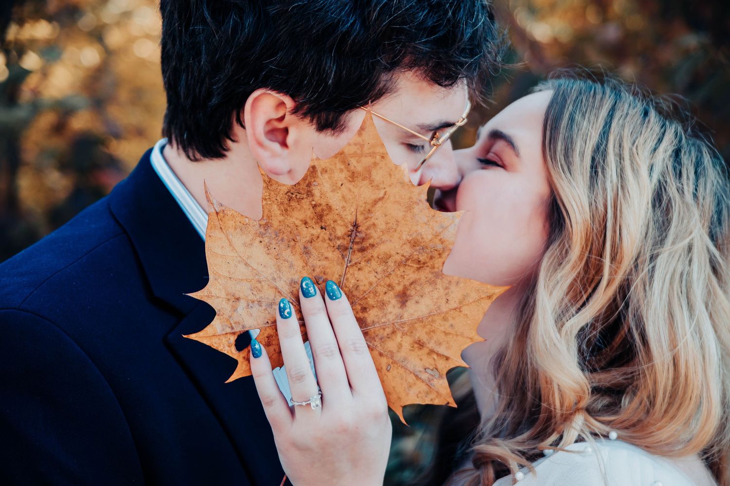 Romantic autumn photo series showing a couple in profile sharing tender moments among golden leaves.