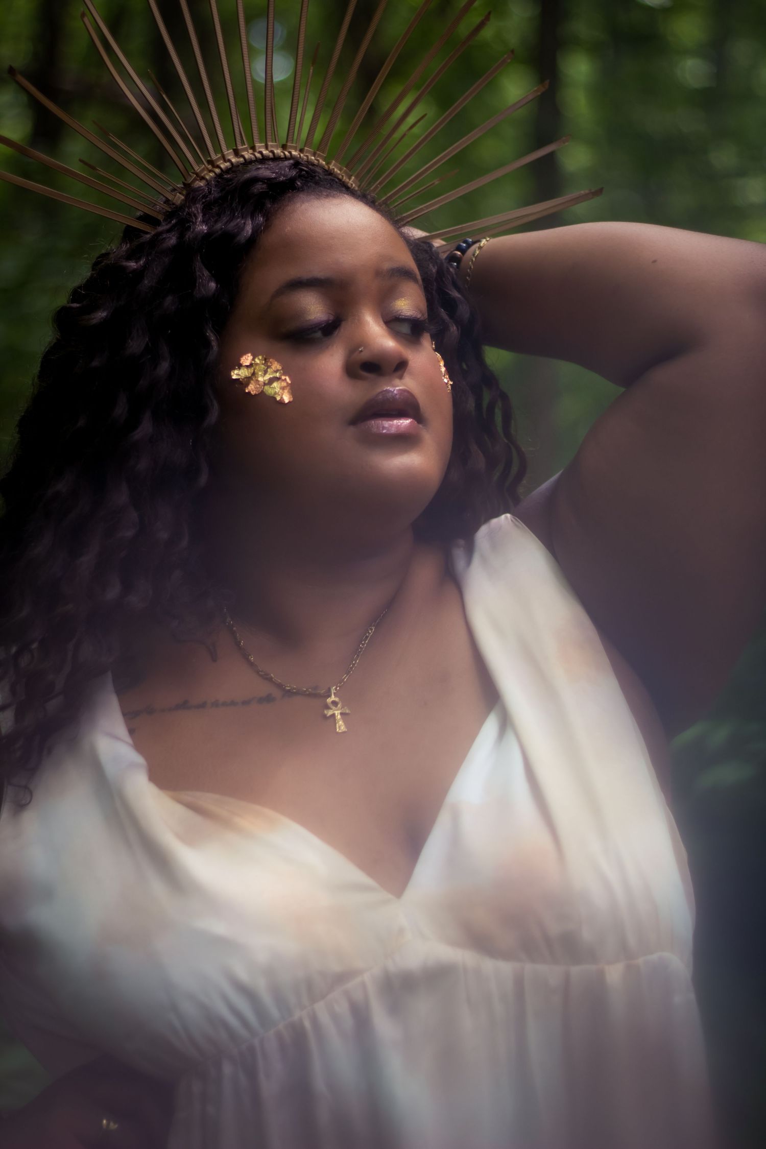 A dreamy portrait series in a garden setting shows a person in white clothing against lush greenery and palm fronds.