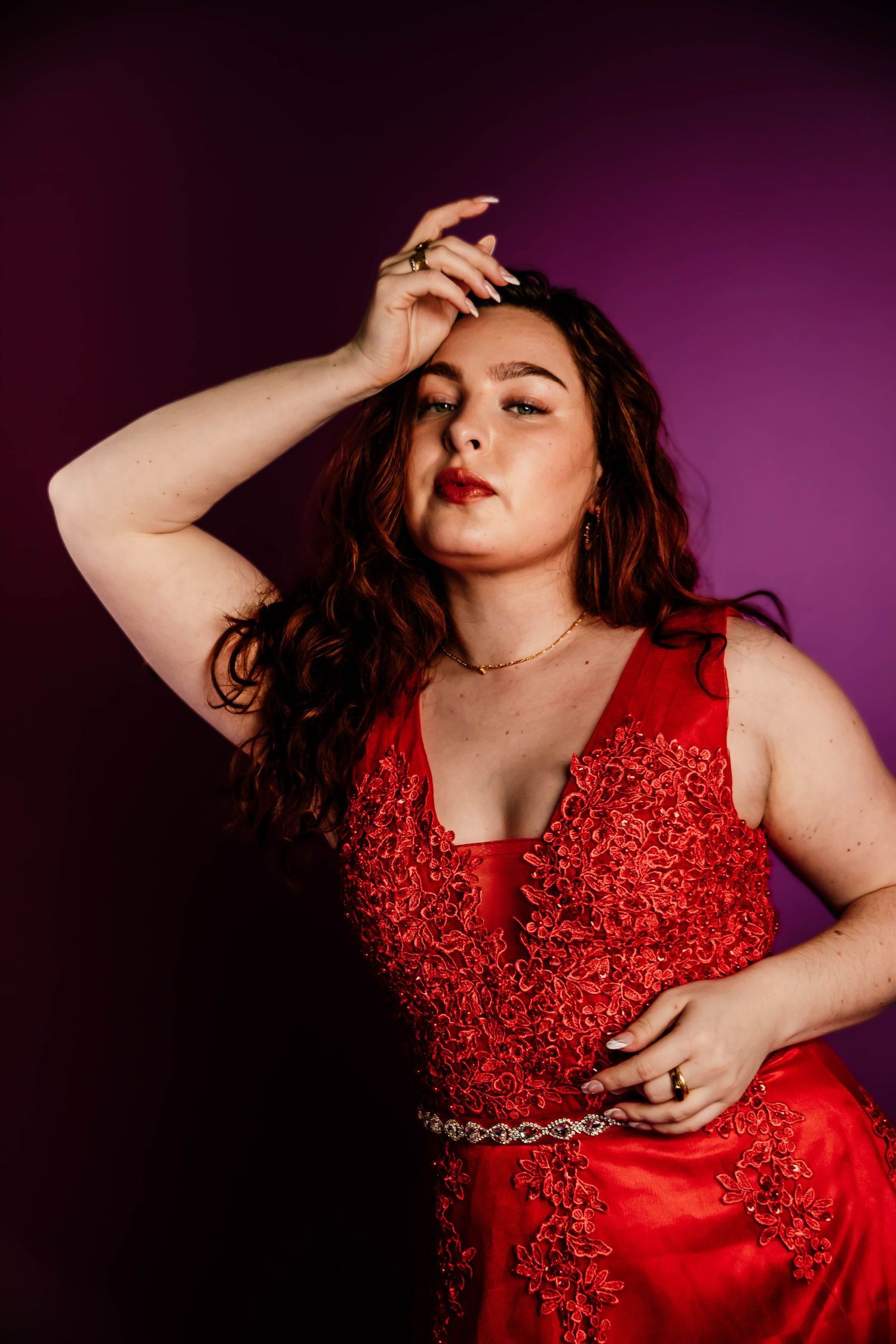 A dramatic fashion portrait series featuring a model in a sparkly red dress against a purple backdrop.