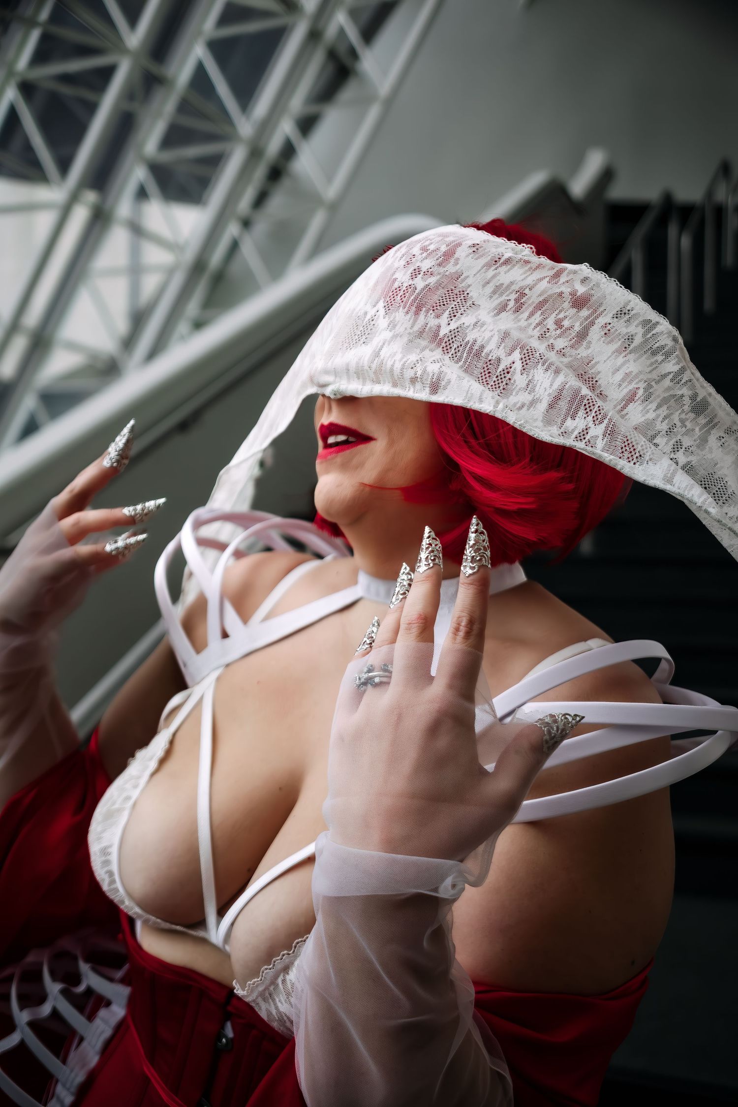 A series of artistic boudoir photos showing a figure in white lace and red lipstick posing dramatically.