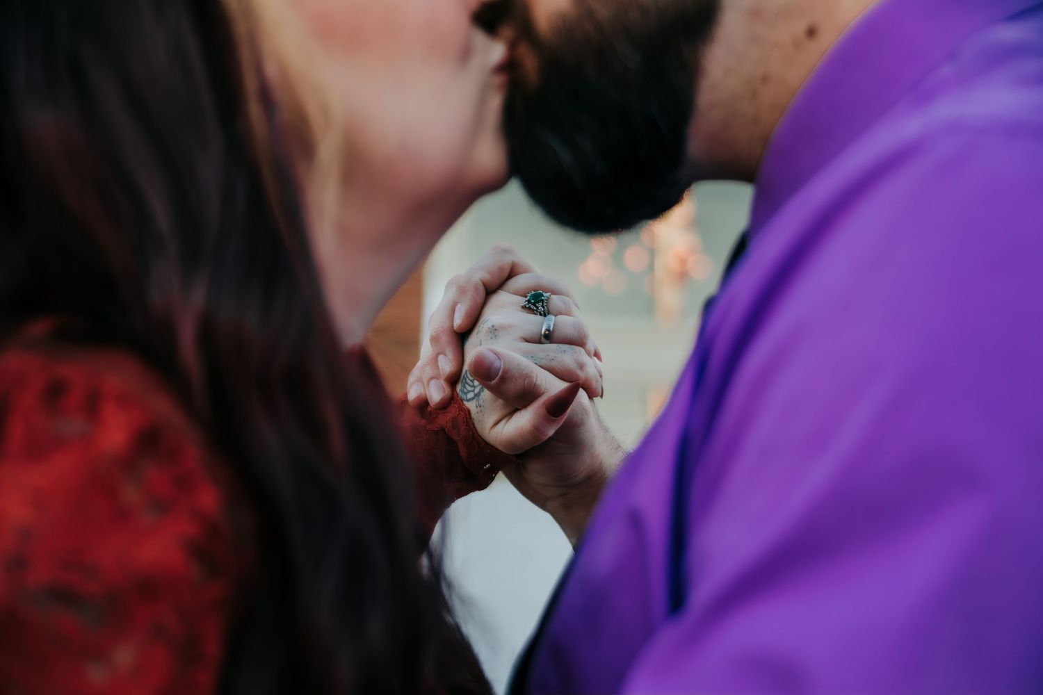 A series of cropped photos showing hands holding a wedding ring in various poses against purple and dark backgrounds.