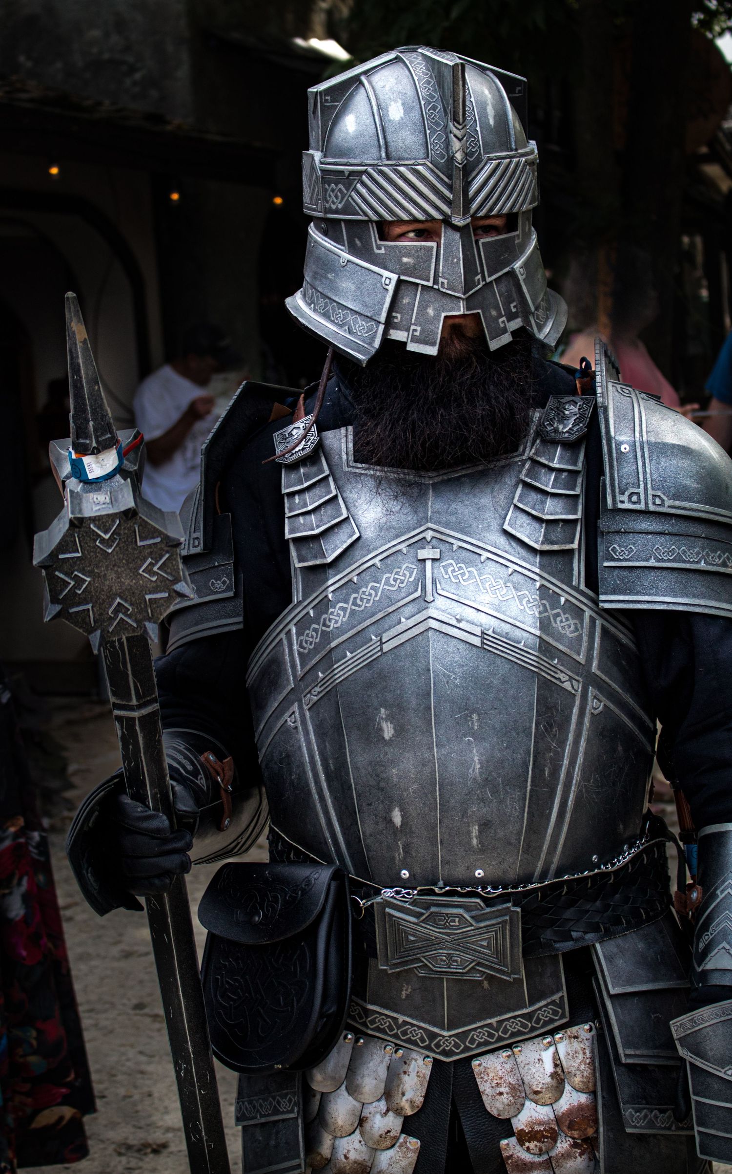 Medieval knight armor display with detailed metal plating and intricate design.