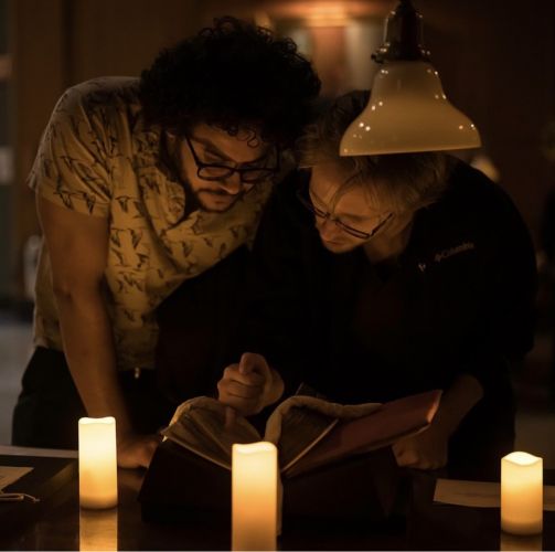 A romantic candlelit scene with soft lighting and glowing candles creating an intimate atmosphere.