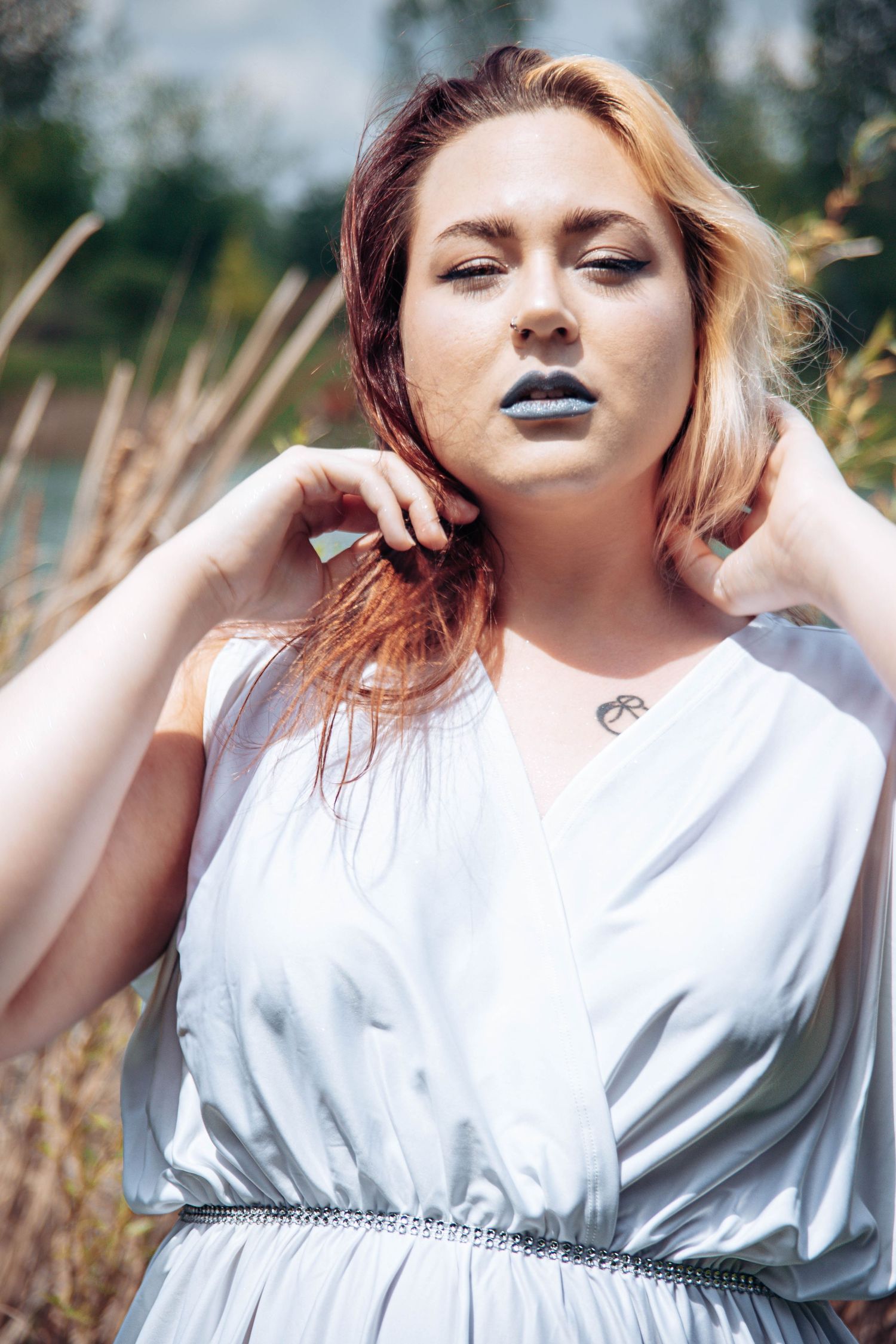 A series of artistic portraits showing someone in a white dress posing dramatically against a natural outdoor background.