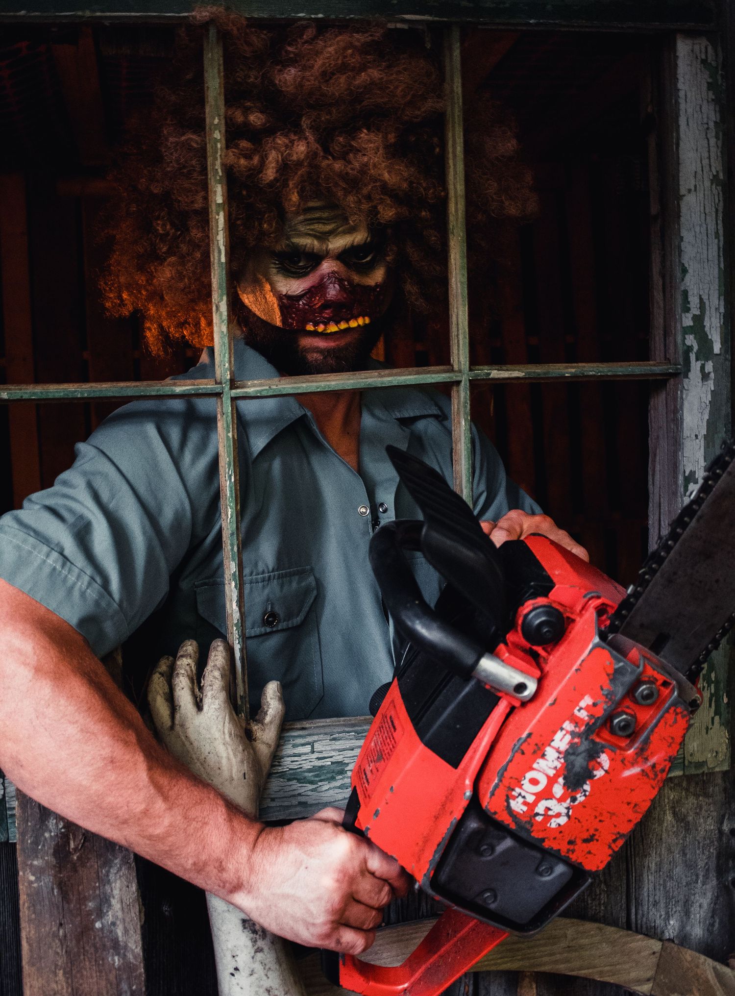 A person in gray clothing demonstrates the steps of starting a chainsaw in a sequence of detailed close-up shots.