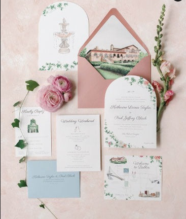 Elegant wedding invitation suite in soft pink and white with floral accents and watercolor venue illustrations.