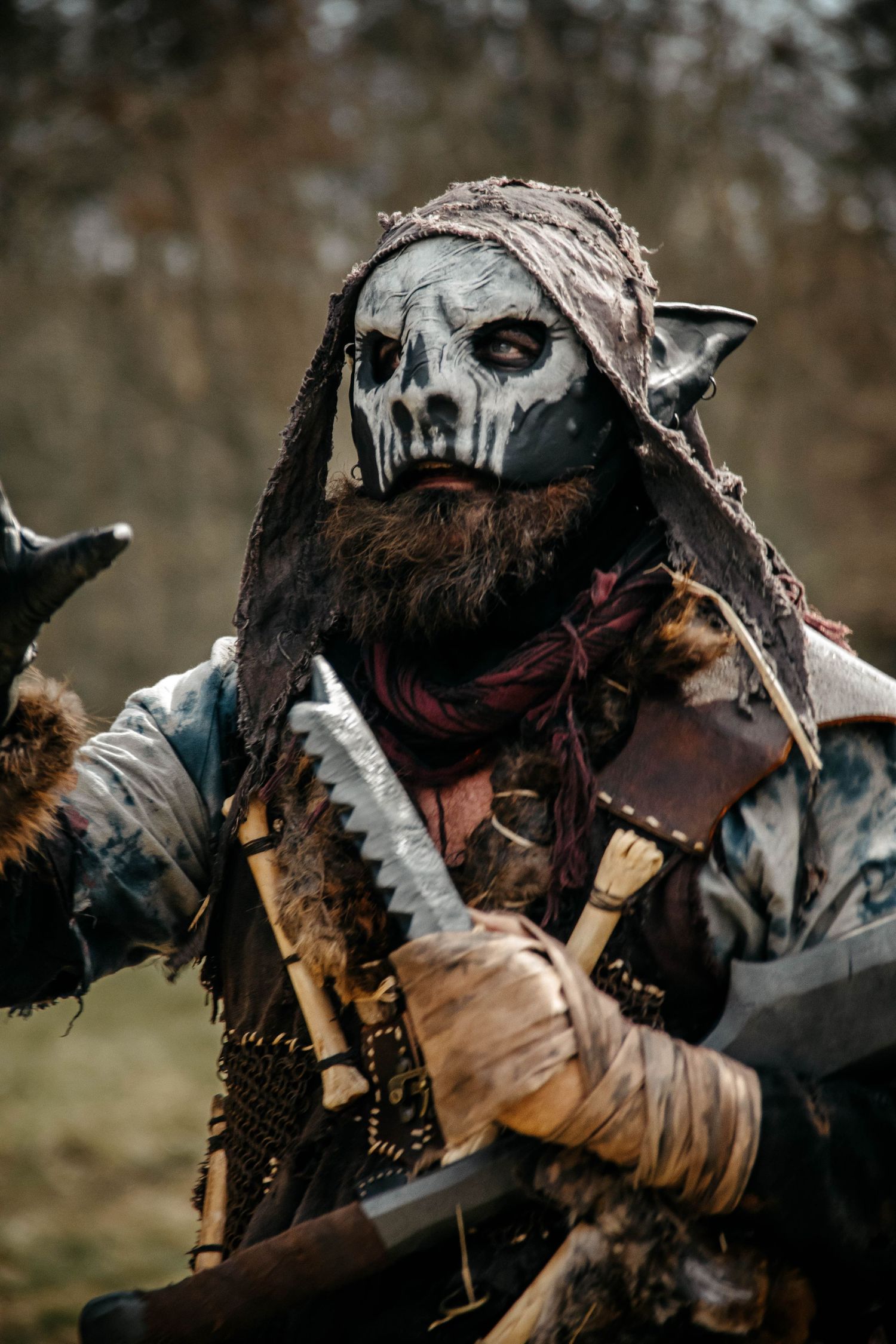 A sequence of action shots showing two costumed warriors engaged in dramatic medieval combat with swords.