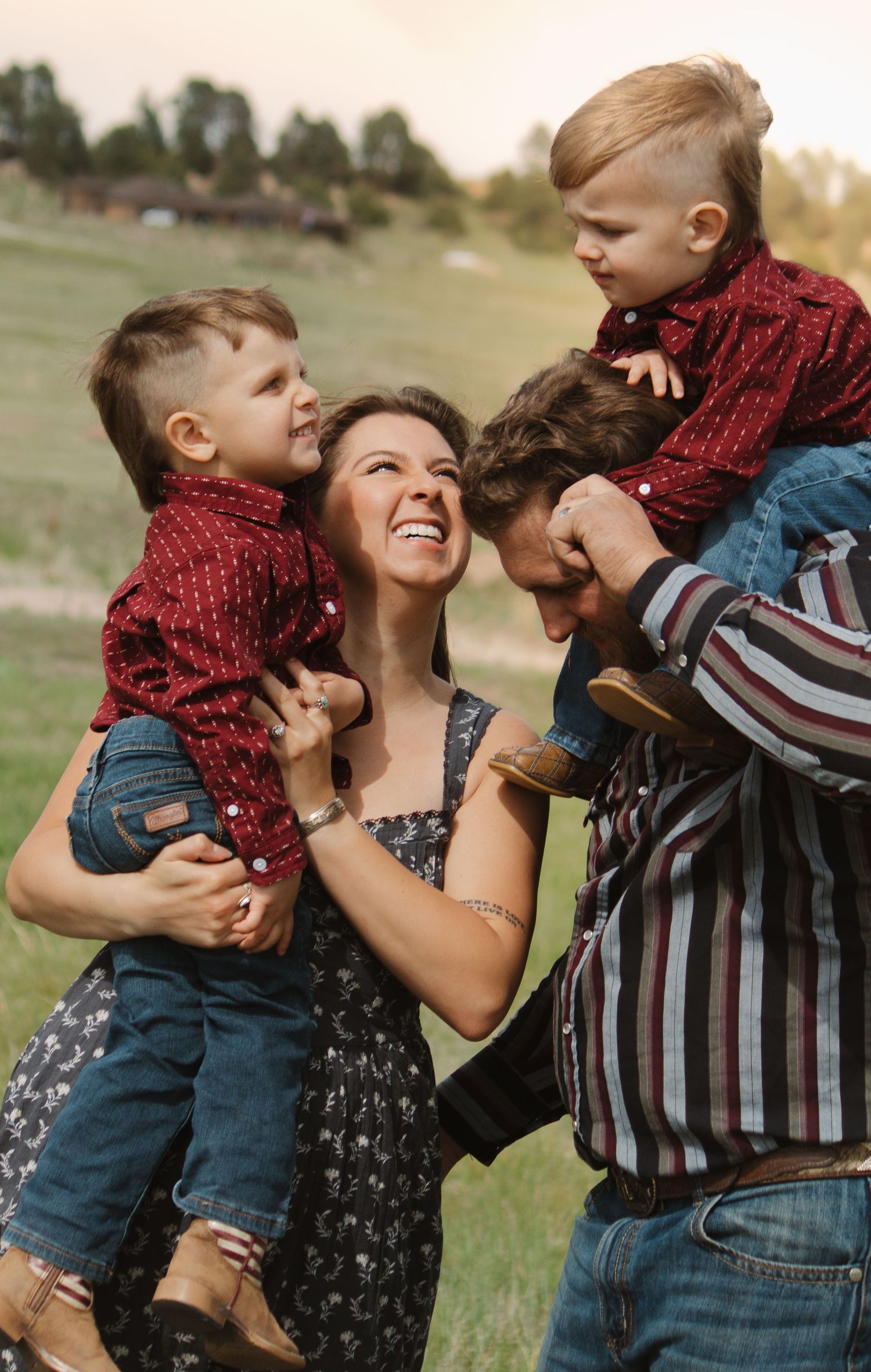 Playful family photoshoot sequence showing laughter and joy in a sunny meadow.
