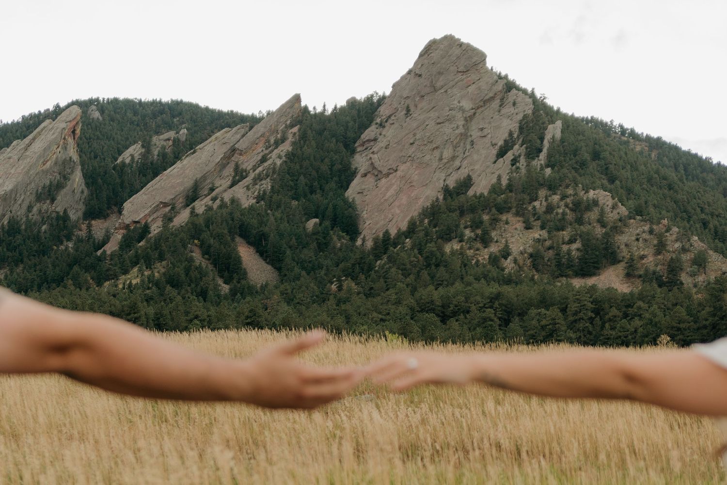 A scenic view of the Flatirons rock formations in Boulder, Colorado with multiple images showing different angles.