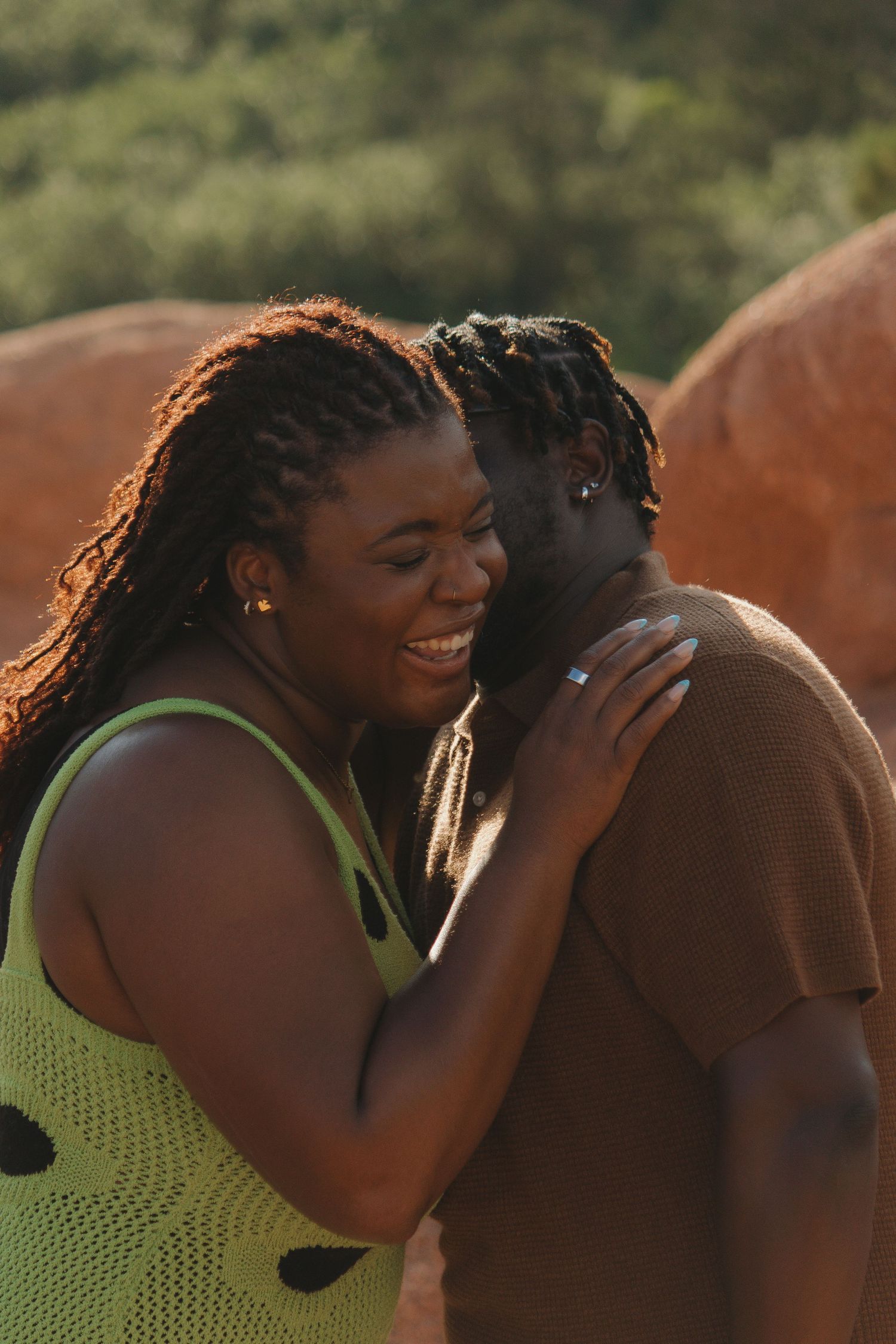 A sweet moment between two people captured in golden hour lighting.