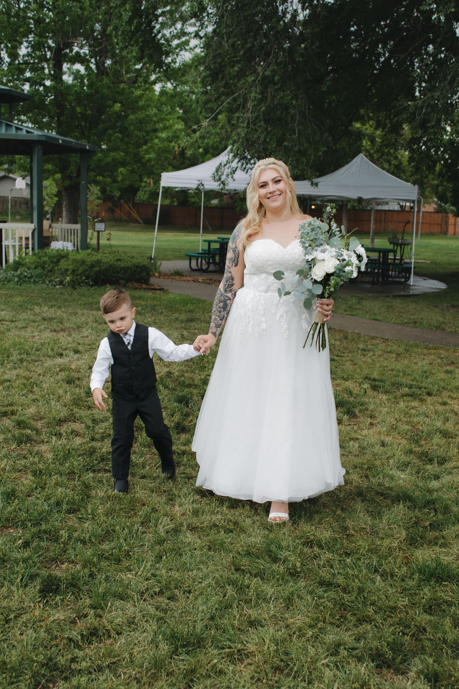 A series of candid wedding photos showing interactions between the bridal party on a grassy field.
