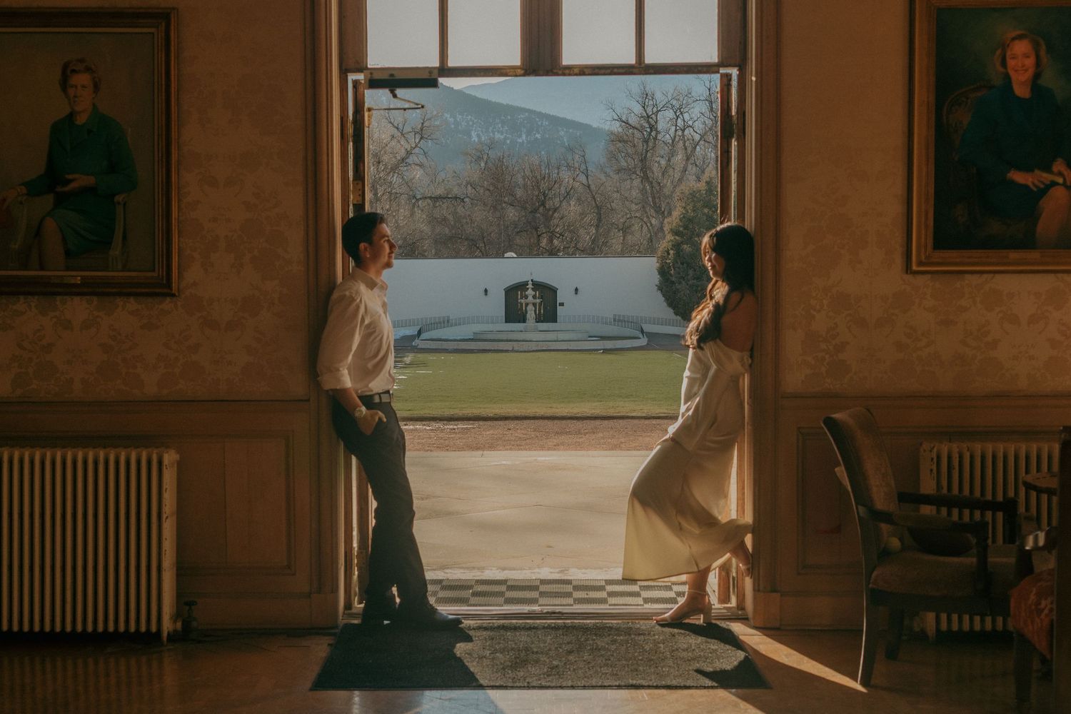 Multiple frames show a couple's intimate dance sequence in a sunlit historic interior with large windows.