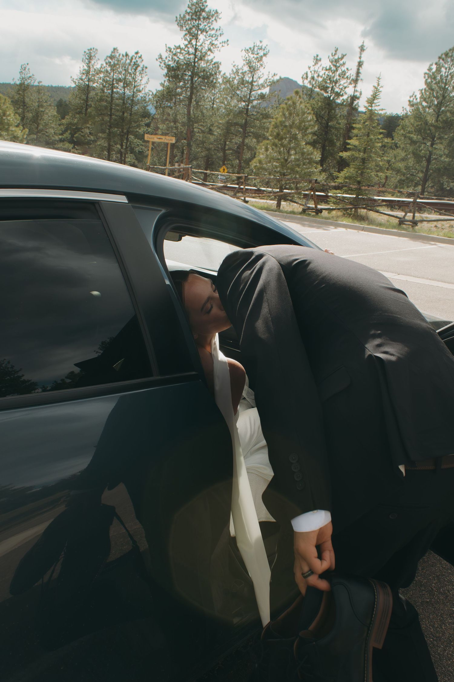 A series of candid car interior shots showing passengers through the window against a forest backdrop.