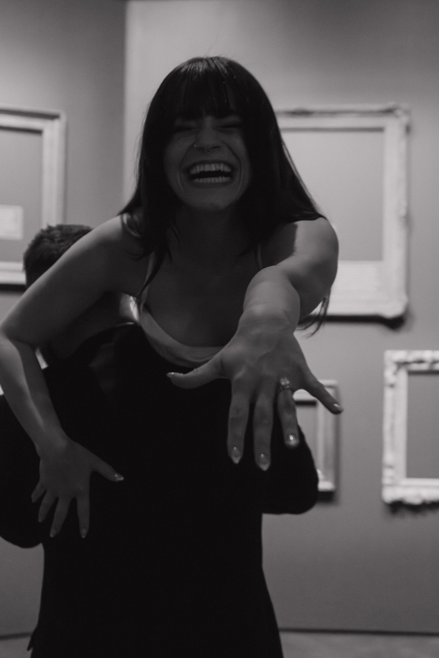 A sequence of expressive dance movements captured in black and white photography.