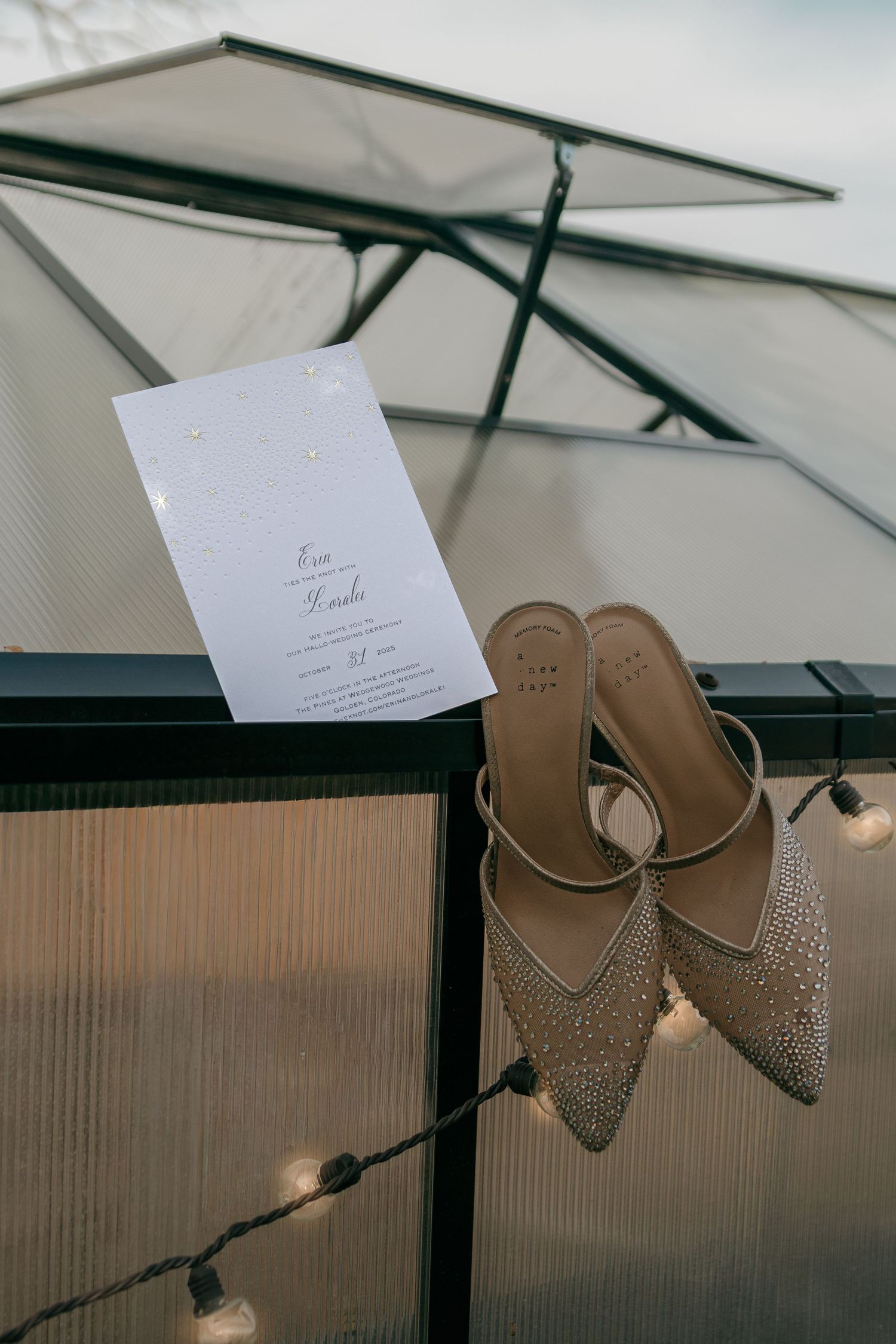 A series of minimalist wedding detail shots showing elegant invitations and brown leather sandals against a soft background.