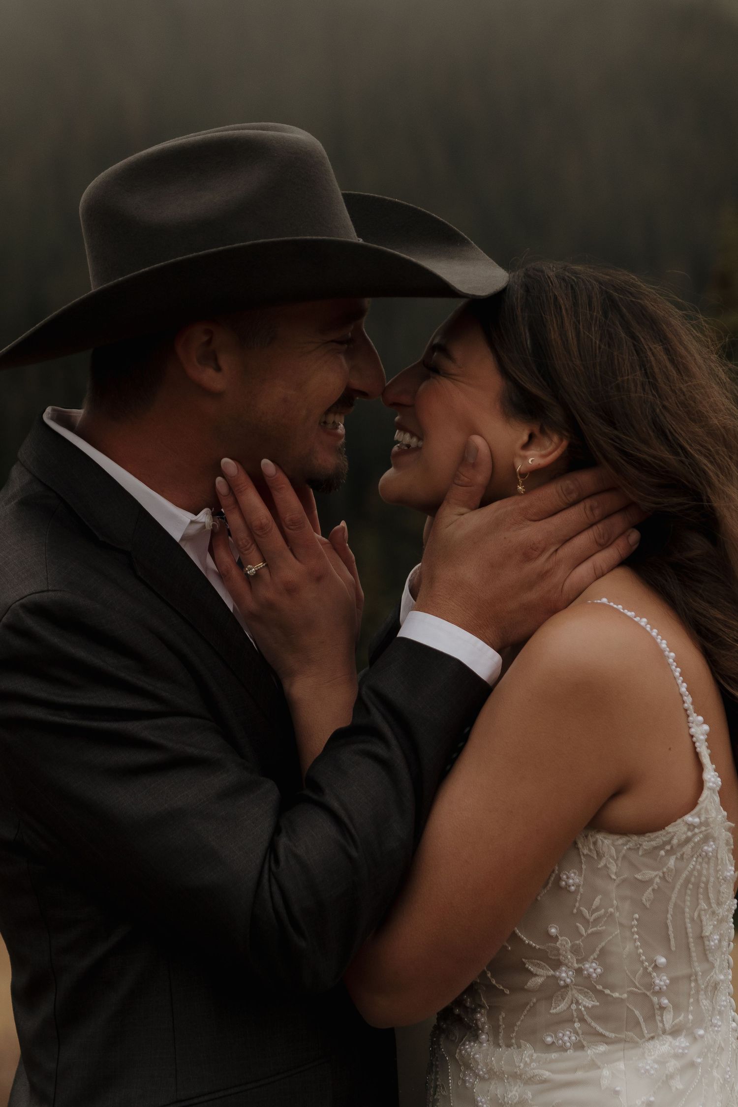 An intimate wedding moment captured at dusk with a western style aesthetic.