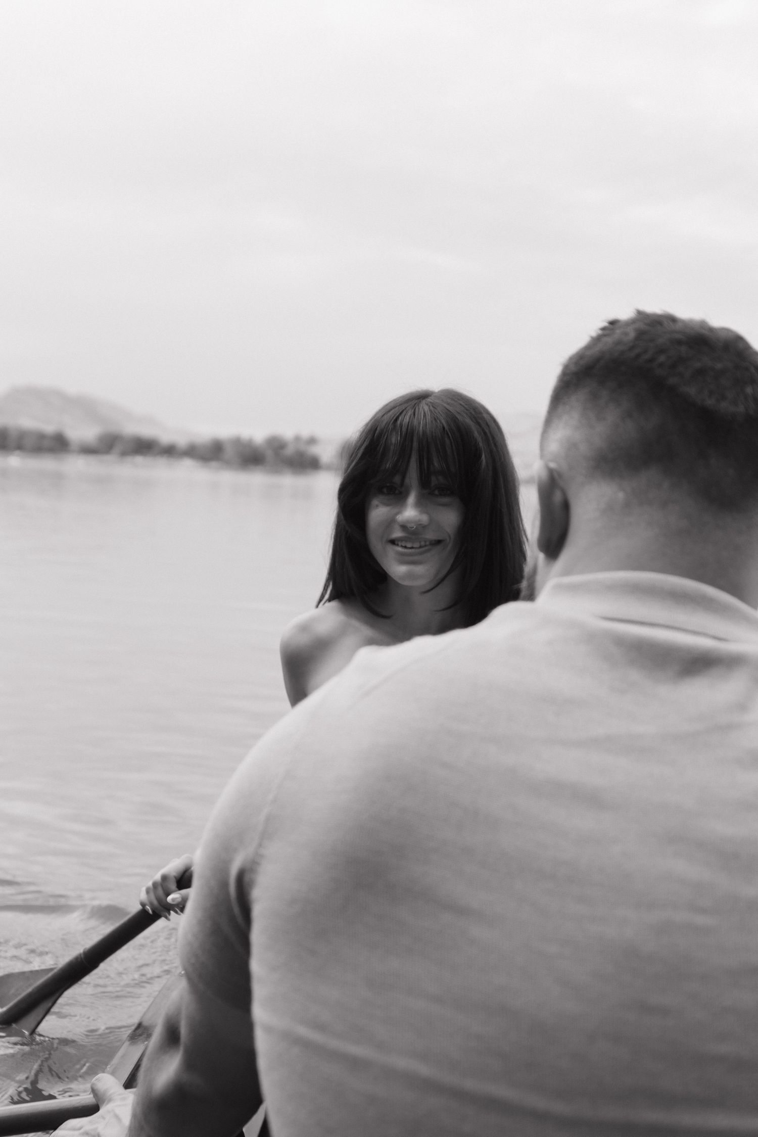 Black and white series of intimate moments on a boat.