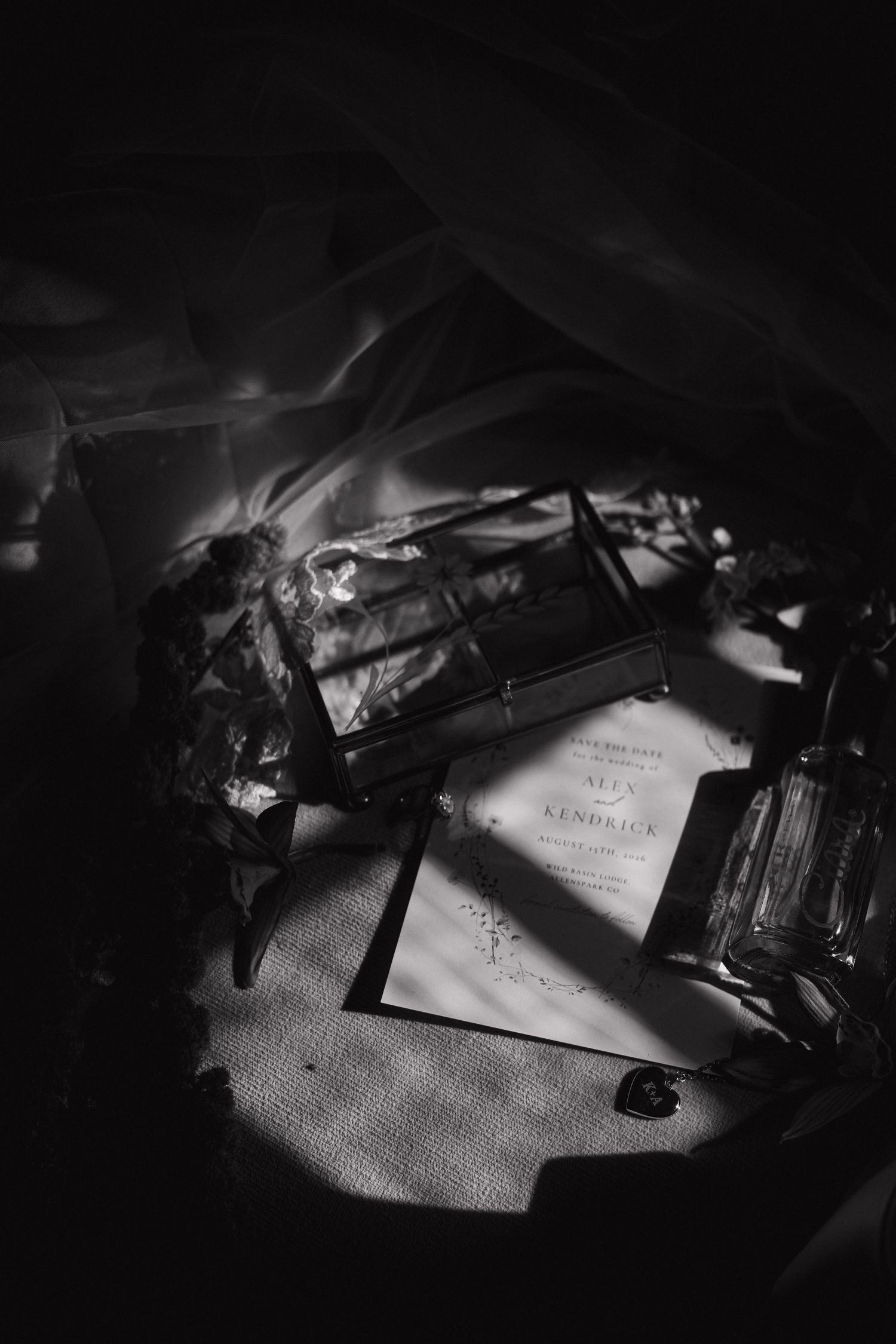 Dramatic black and white photograph of papers and documents in shadow.
