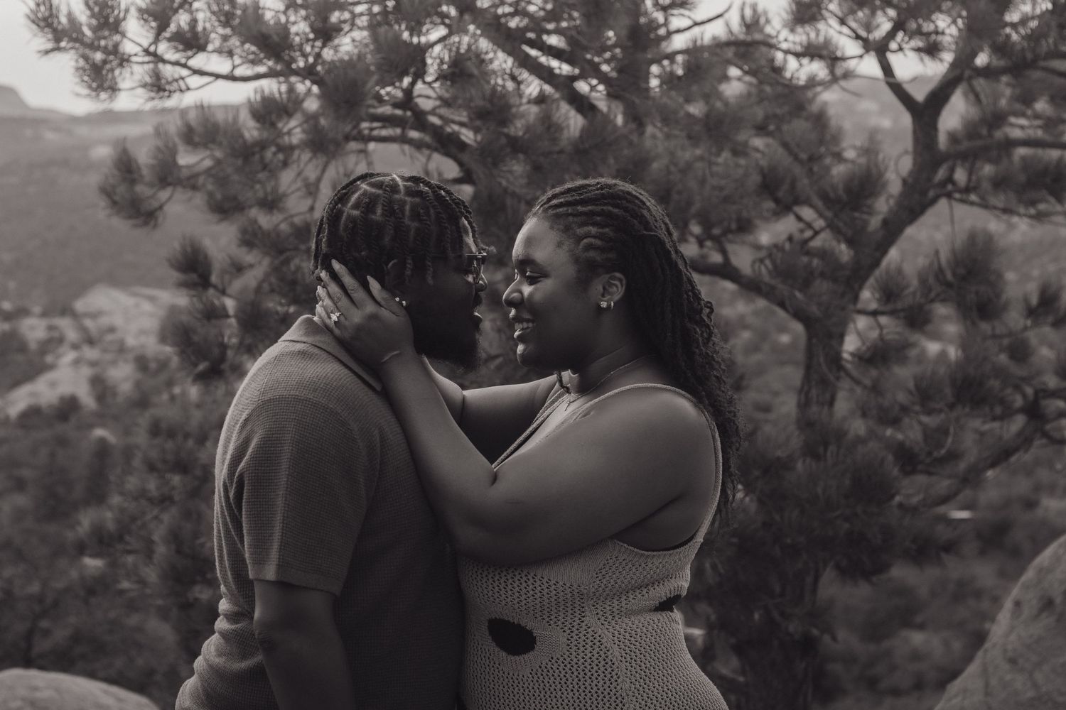 A series of black and white couple portraits show intimate embraces against natural outdoor settings.