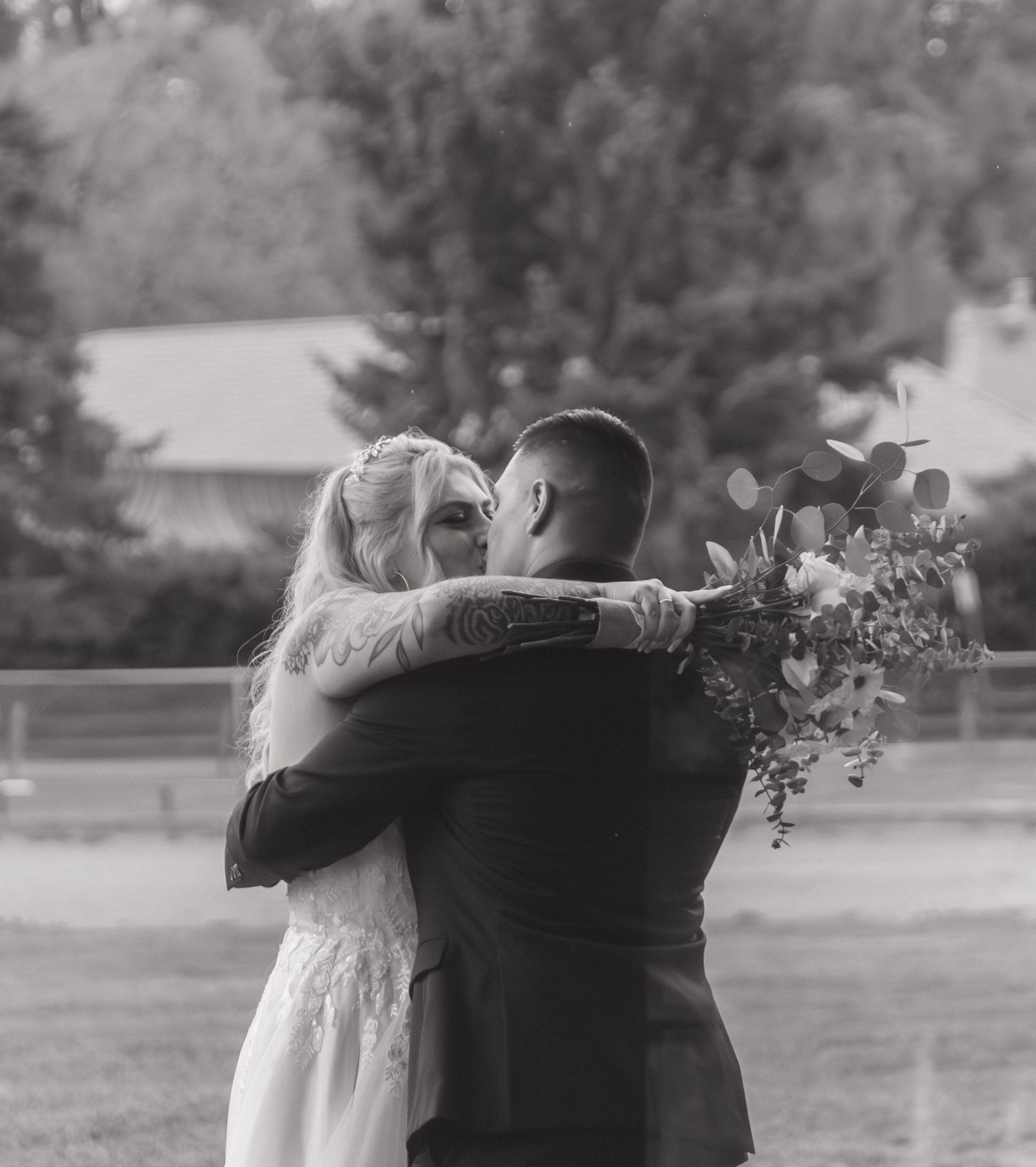 Black and white sequence showing a romantic embracing couple with floral bouquet.