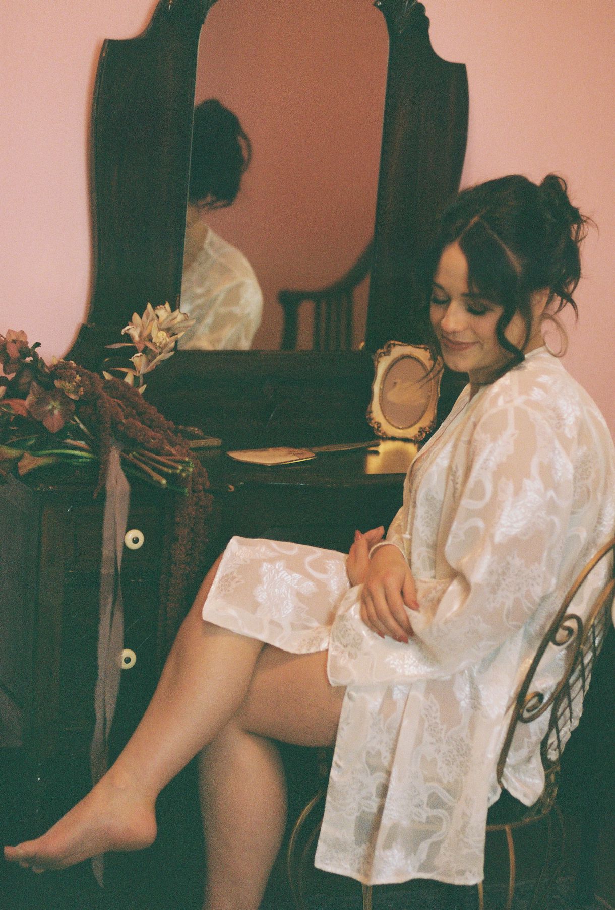 A vintage-style photo series showing someone in a white shirt against a pink background.