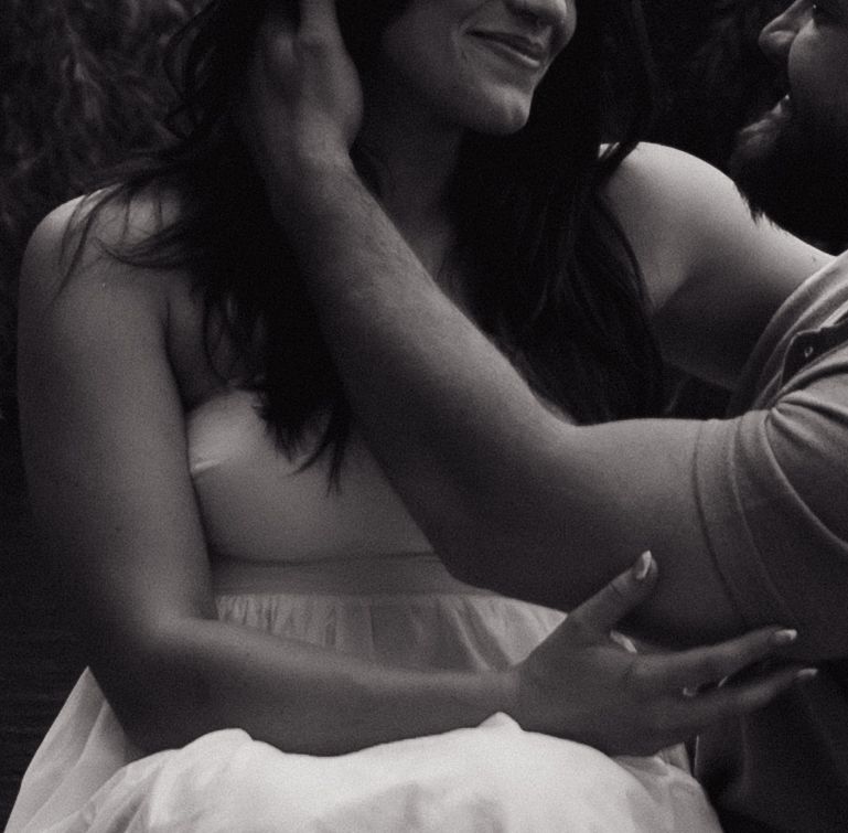 A series of black and white photographs showing hands making expressive movements and gestures.