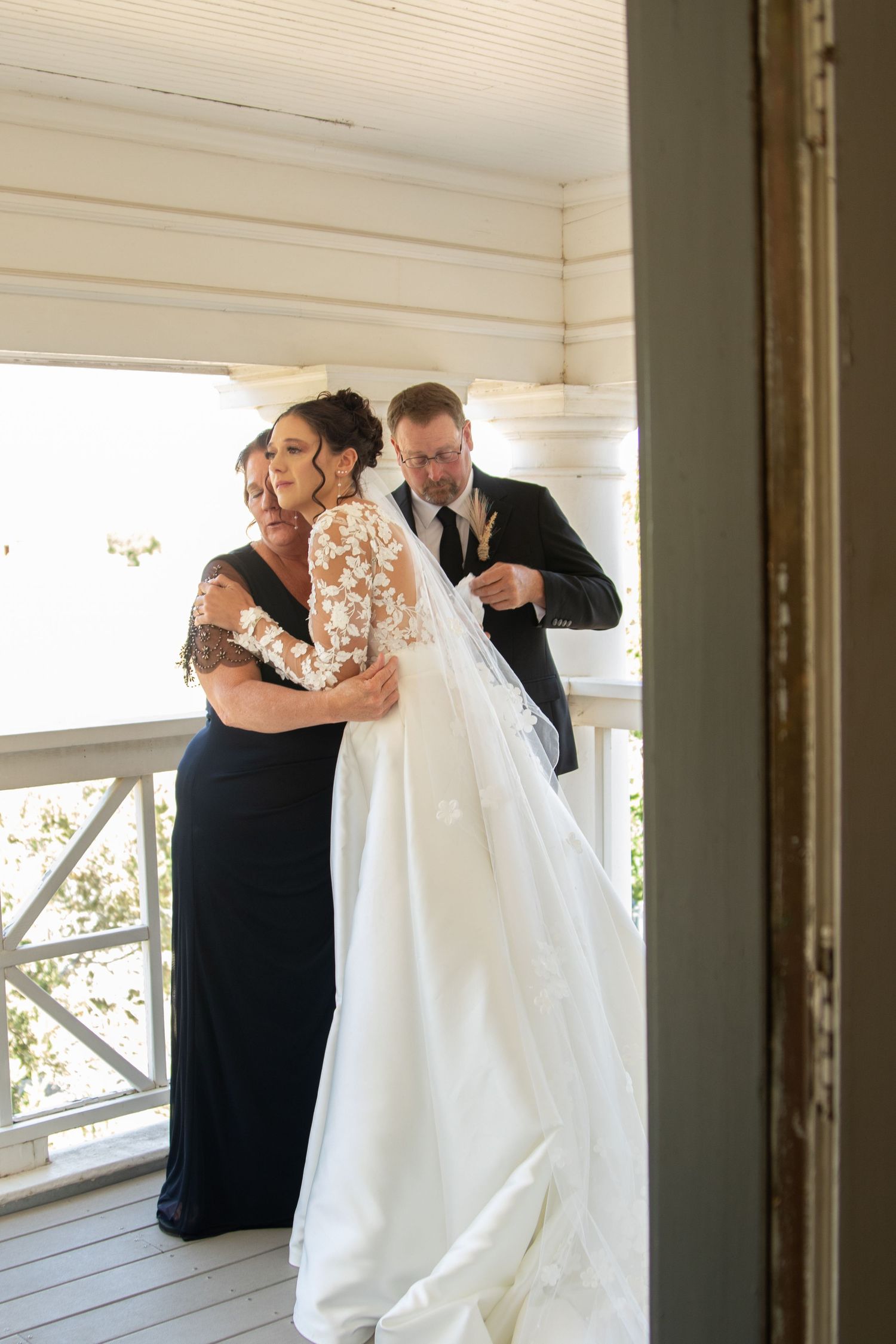 Series of romantic first dance moments at a wedding with bride in white flowing gown and groom in dark suit.