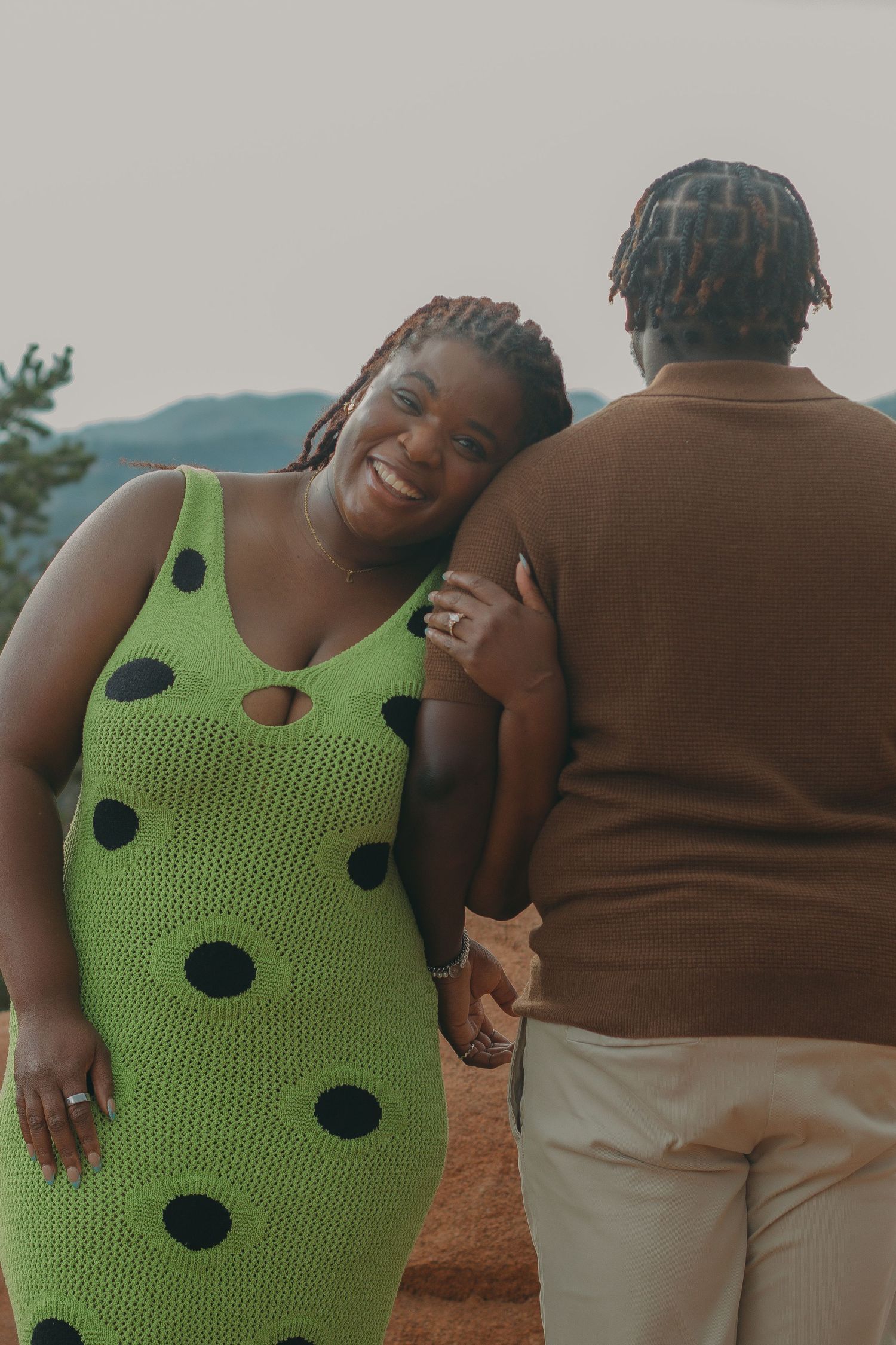 A series of intimate photos capturing laughter and sweet moments between a couple outdoors.