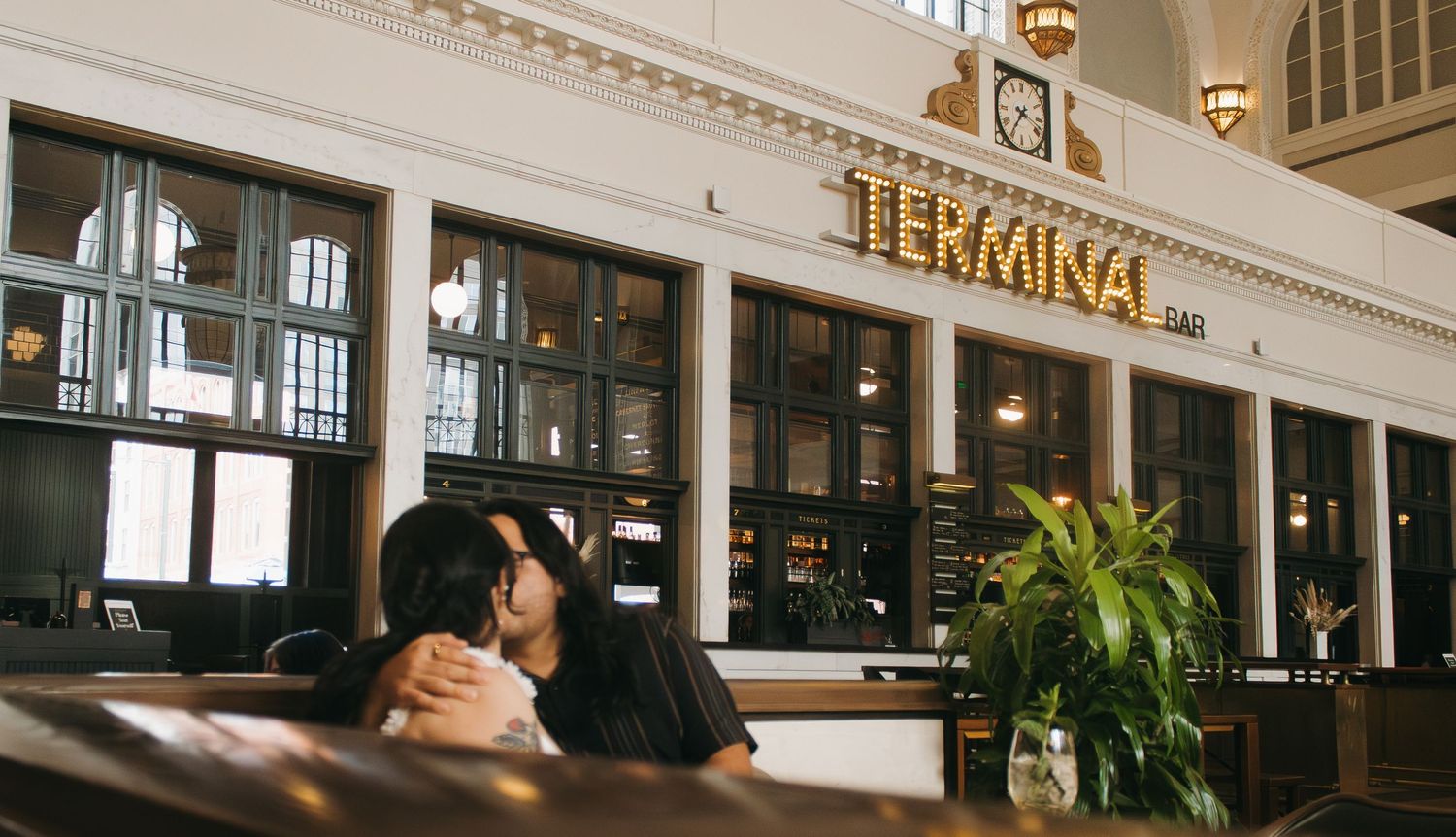 Elegant restaurant interior with vintage columns, classic decor, and 'Teppanyaki' signage visible in warm lighting.