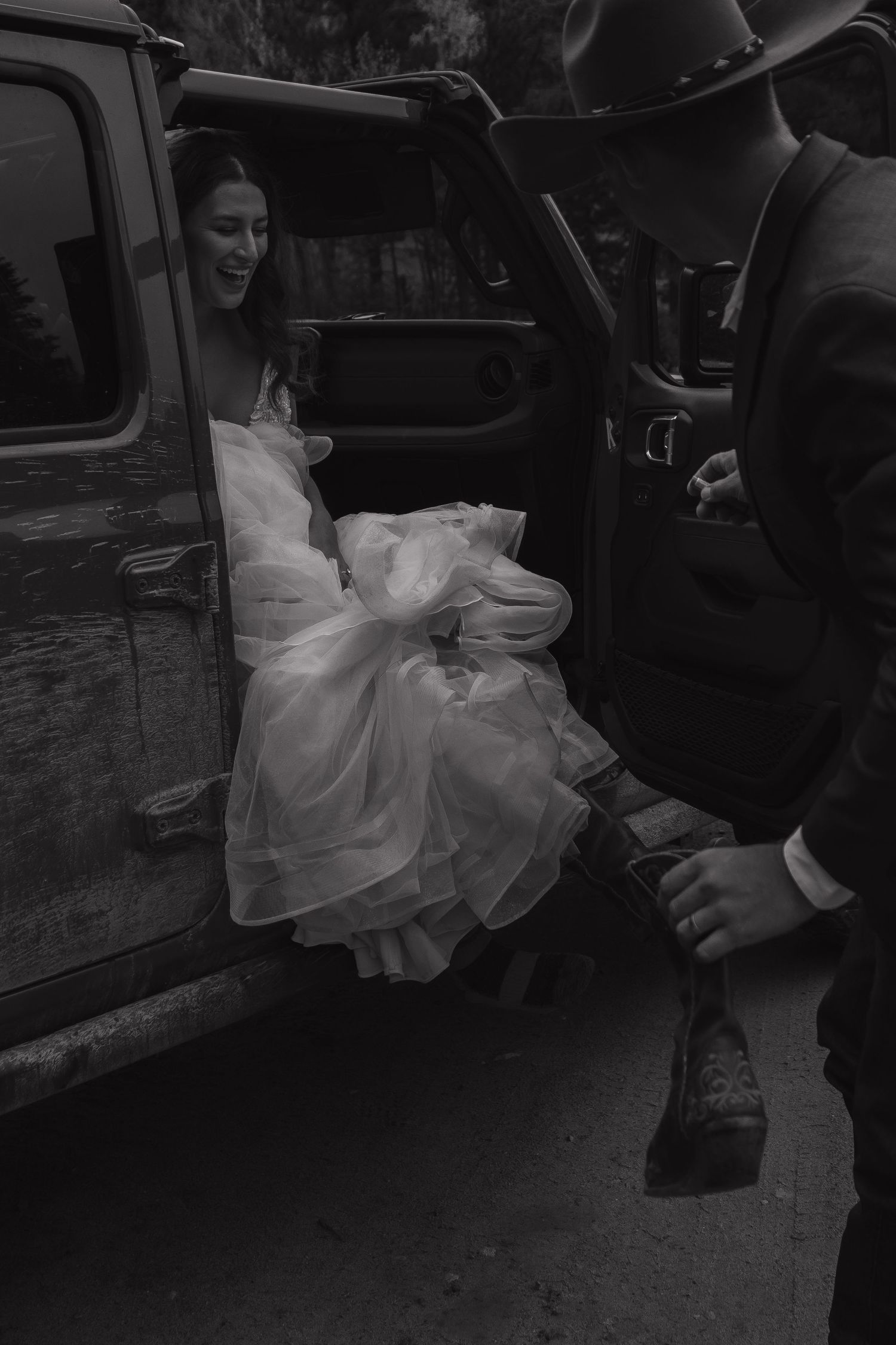 A sequence showing assistance getting into a classic car in formal wedding attire.