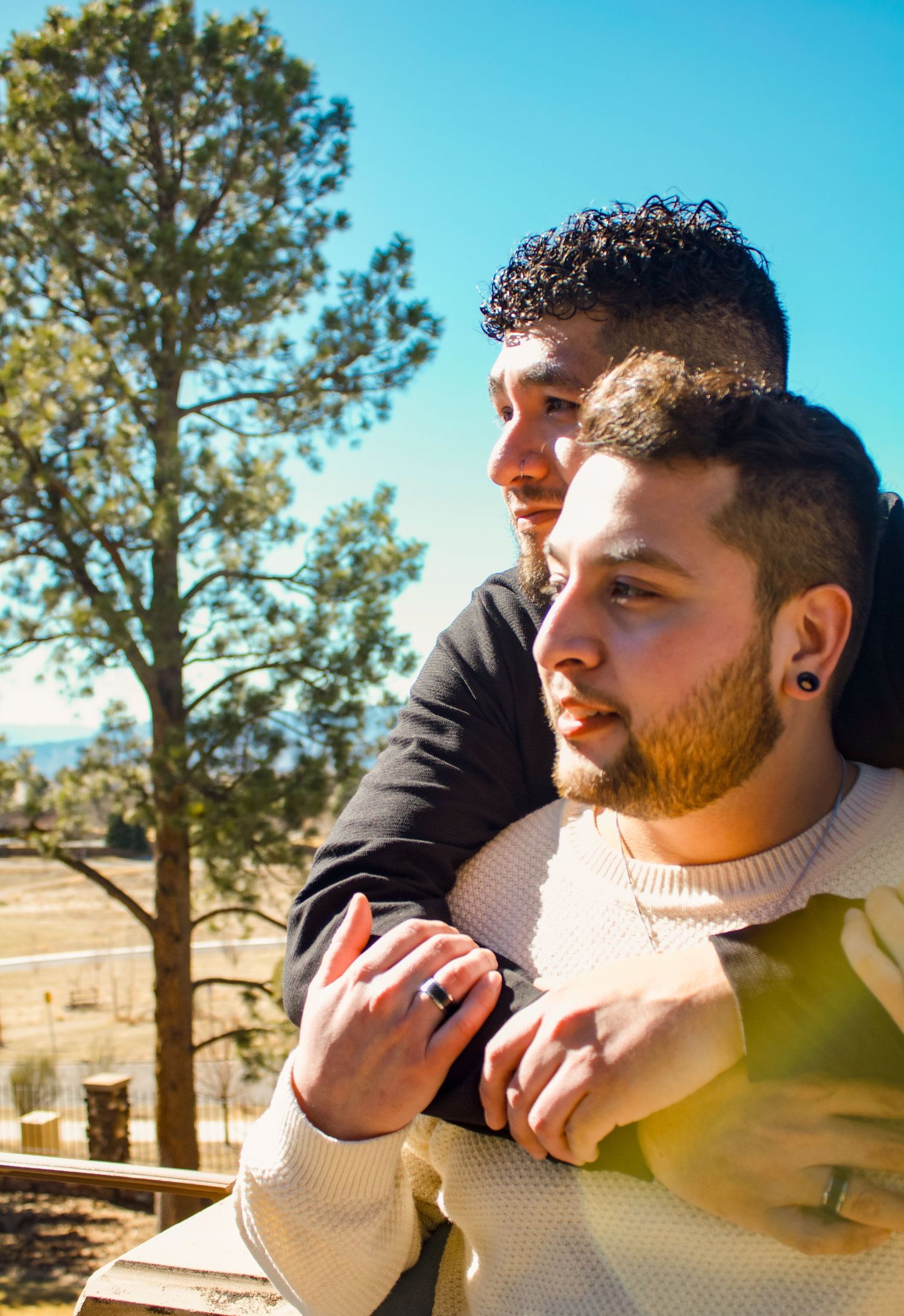 A series of candid shots showing two people sharing intimate moments in natural sunlight.