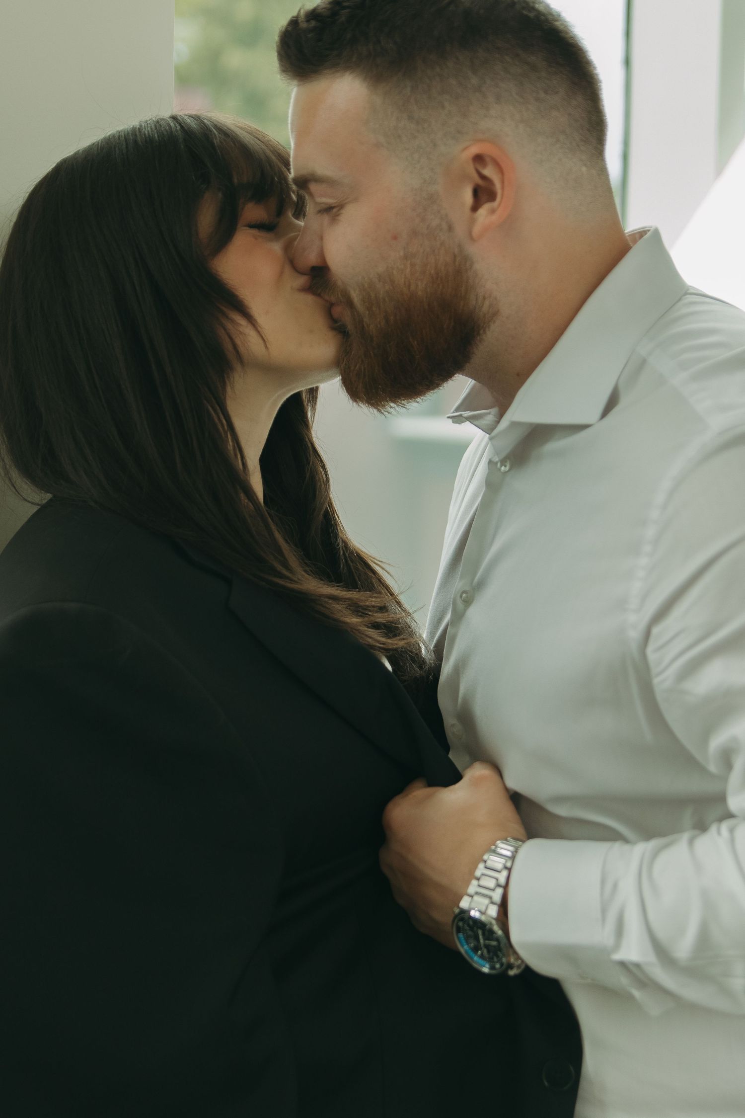 Close-up sequence of a romantic moment shown in progressive frames against a bright background.