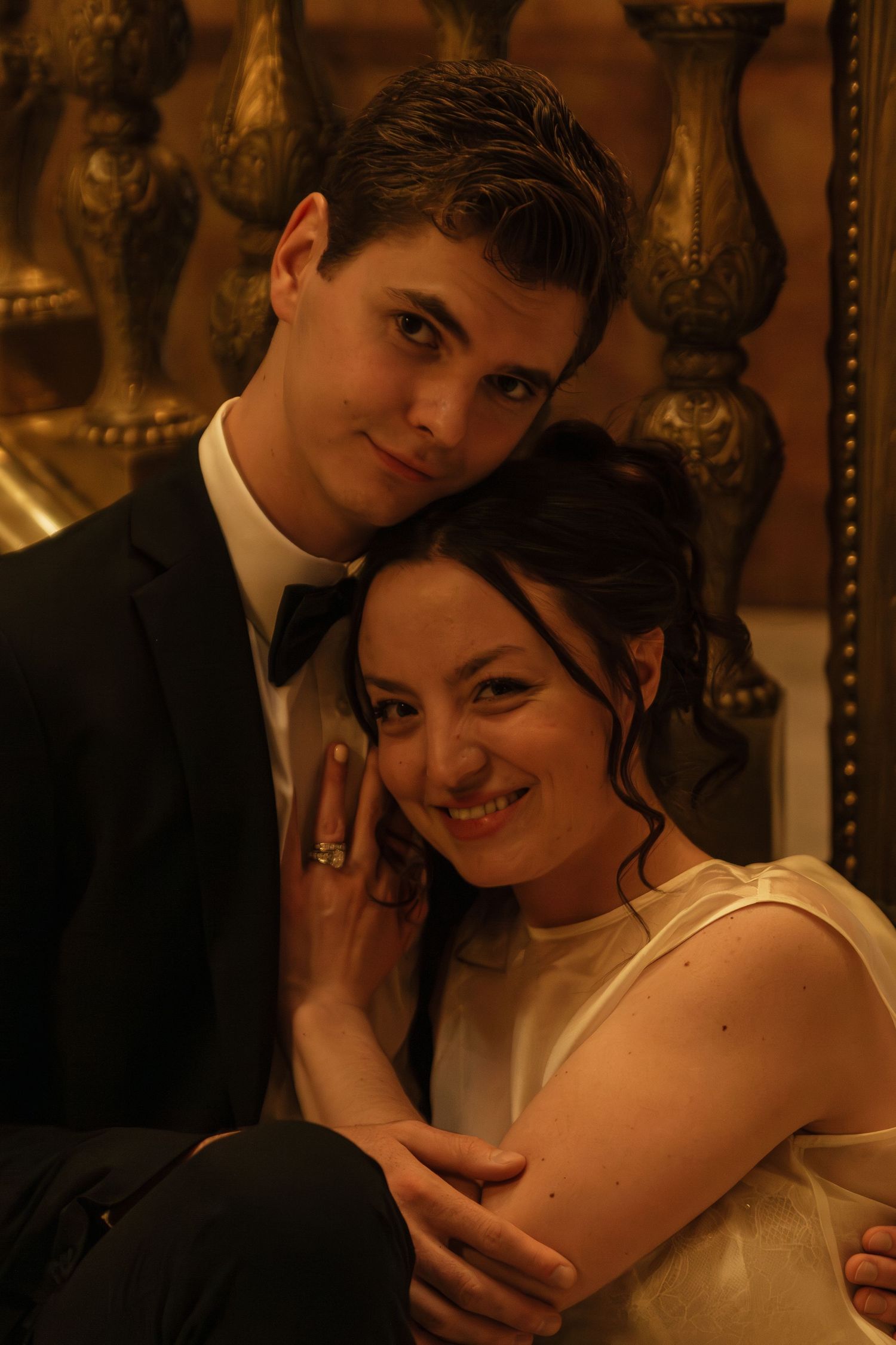 Intimate wedding portraits captured in warm lighting with vintage-style framing.