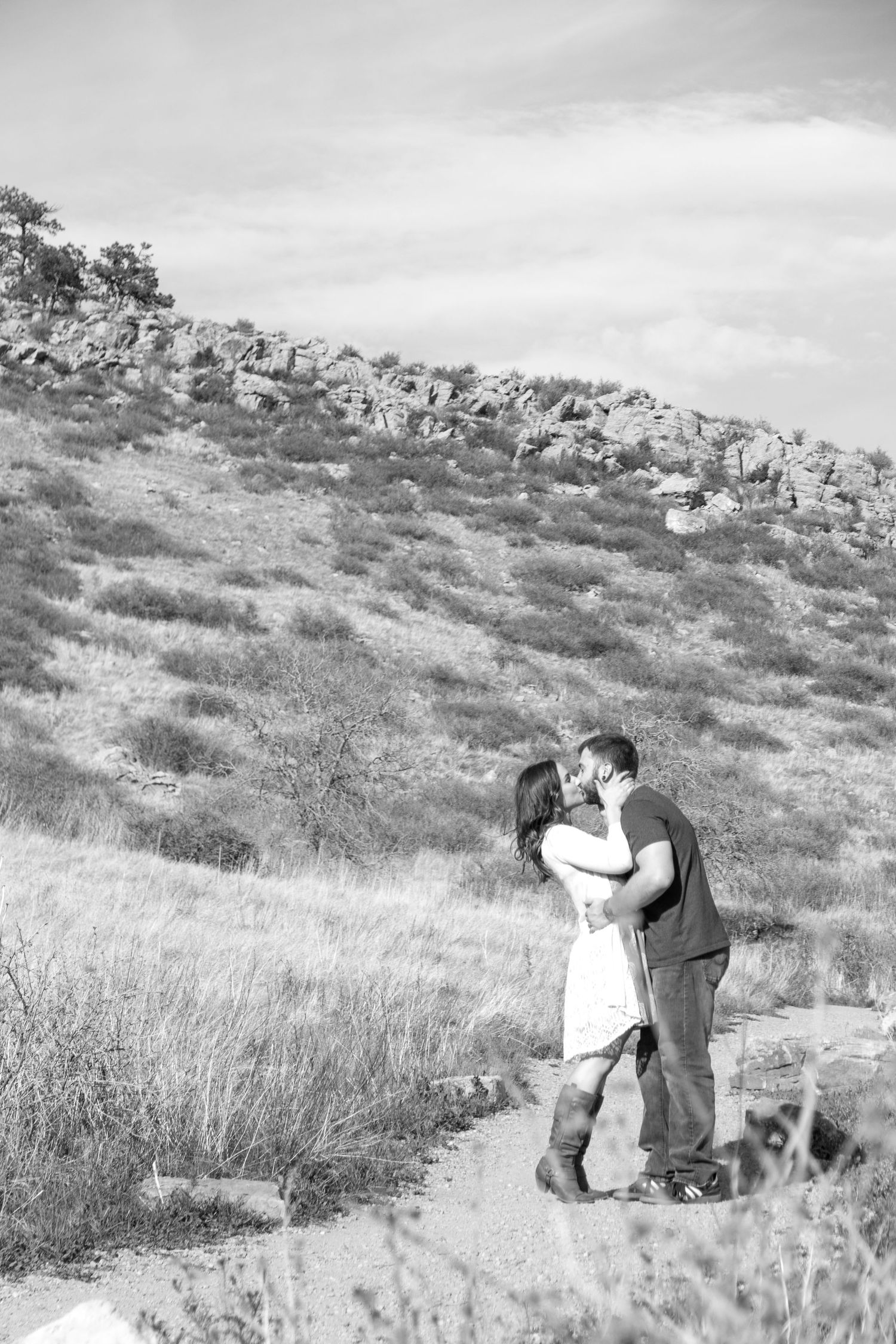 Black and white couples portrait on nature trail near Boulder Colorado, romantic lifestyle photography by Cassandra Jene